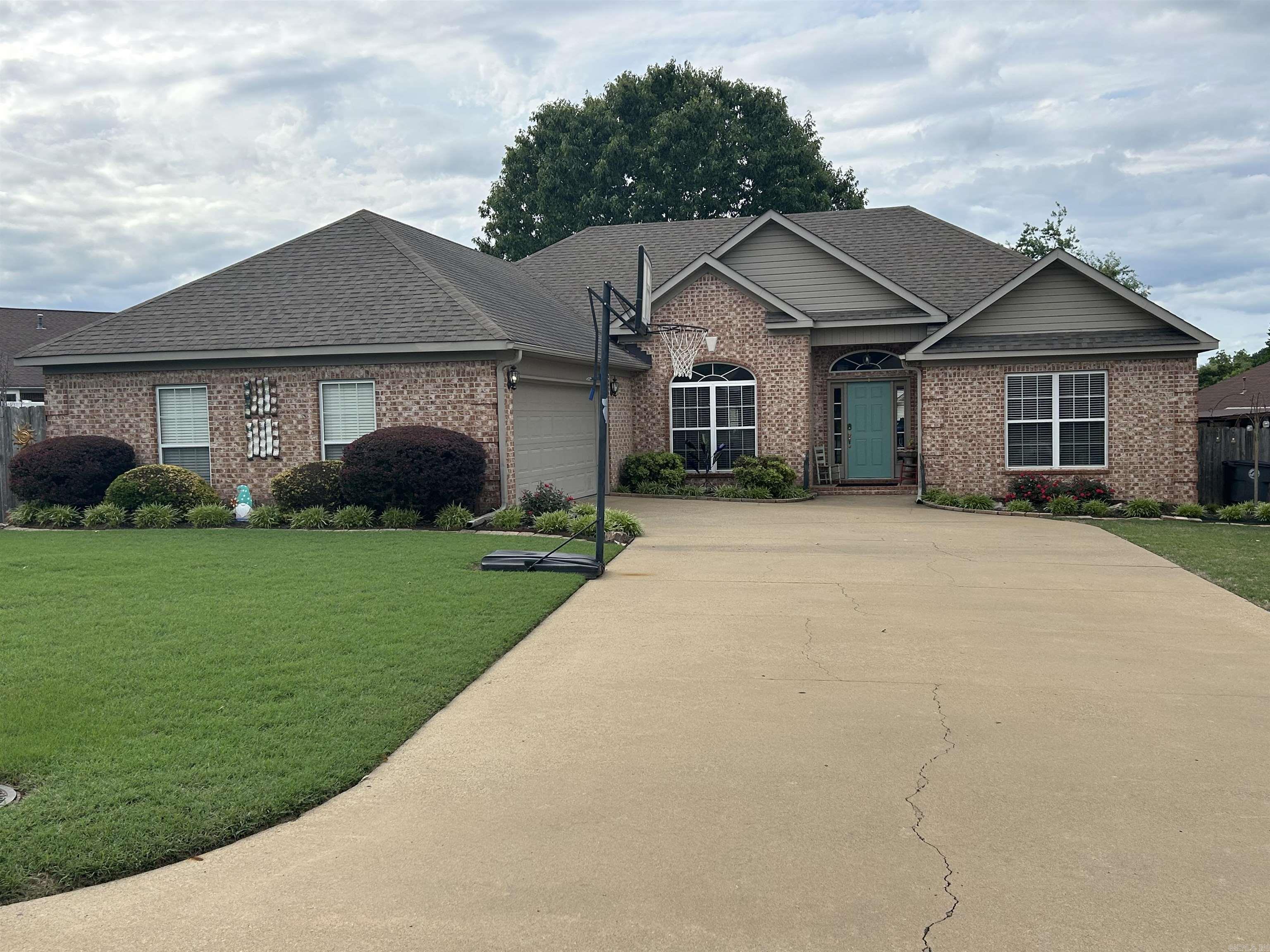 Extremely well maintained home with split bedroom plan, Sep dining room, tall ceilings and lots of molding and trim.  fireplace, formal dining room, large laundry room with sink, master suite features his and her closets, jetted tub and walk in shower, very nice pantry, Kitchen has lots of cabinets and eating bar, with breakfast area, oversized covered back patio with adjoining gazebo for entertaining.  Privacy fenced large back yard.  Wide concrete driveway and side entry garage.  This home is super clean and pride of ownership is obvious.  This home checks all the boxes.