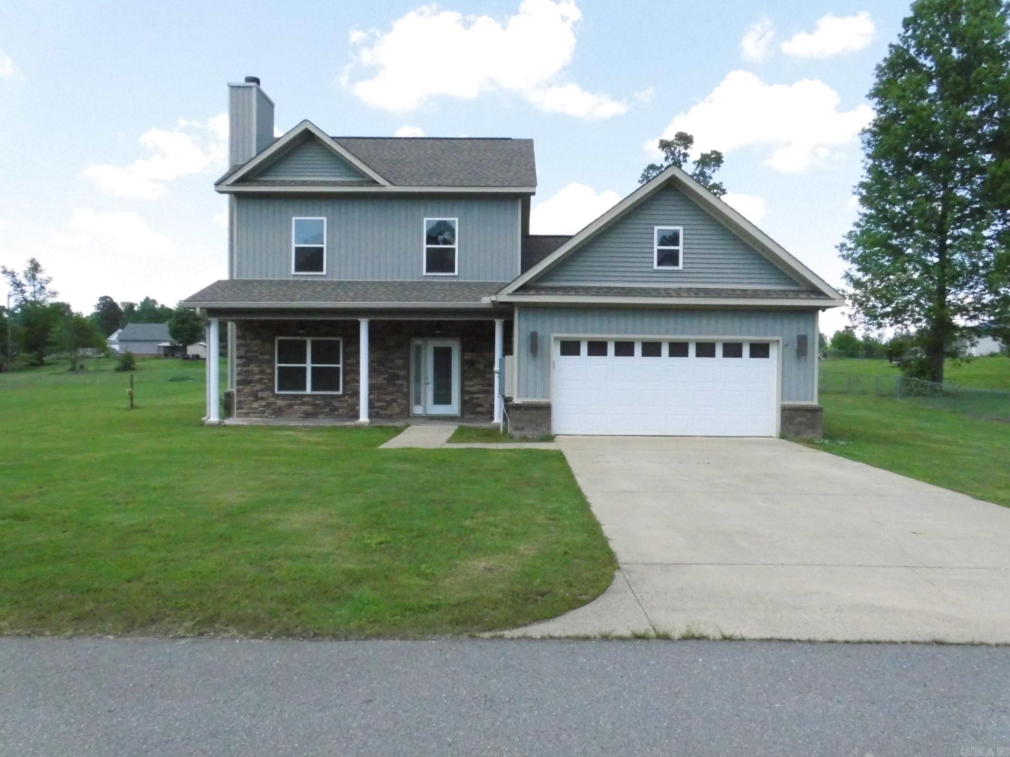 **4 Bedroom with master downstairs**Living room features hardwood floors and WBFP**Tile flooring thru-out rest of home**Kitchen has stainless appliances and granite counter tops**Master bath has walk-in shower with separate jetted tub**3 bedrooms and 1 bath upstairs**Covered back patio and covered front porch** Close knit, kid friendly, neighborhood**Sheridan Schools but only 20 minutes to Little Rock**