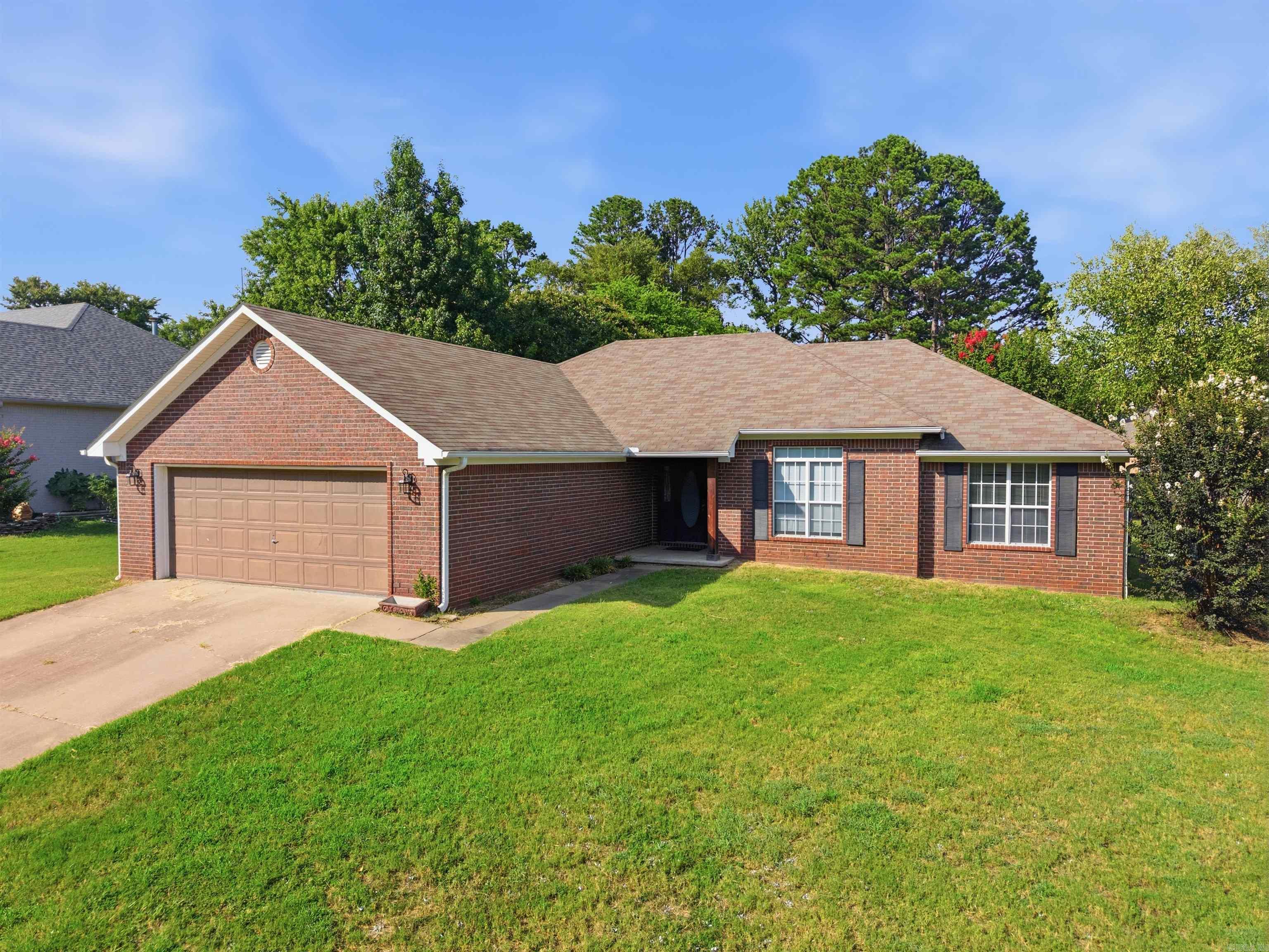 Welcome home to this spacious 3-bedroom, 2-bath home nestled in a beautiful, established neighborhood filled with mature trees. Inside, you’ll love the oversized living area that’s perfect for entertaining or relaxing with family. The open-concept kitchen and dining area features a breakfast bar, abundant cabinet space, and an enormous walk-in pantry for all your storage needs. A versatile bonus room offers endless possibilities as a home office, hobby room, playroom, or flex space. Enjoy your morning coffee in the charming bay window sitting area or unwind on the covered back porch overlooking the fully fenced backyard. With its functional layout, generous living spaces, and inviting outdoor areas, this home offers comfort, flexibility, and timeless appeal in a sought-after neighborhood.
