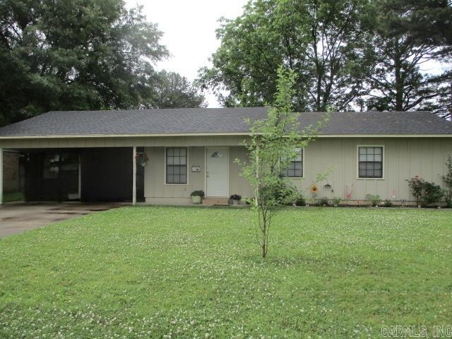 Welcome to this beautiful 3-bedroom, 2-bath home located in a quiet and desirable neighborhood in Wynne, Arkansas. This well-maintained property offers a spacious layout that combines comfort and functionality — perfect for families or first-time homebuyers.  The inviting living room features vaulted ceilings and attractive wood trim, creating a warm and open feel. The large kitchen provides plenty of cabinet and counter space, ideal for meal prep and entertaining guests. A separate dining room adds a touch of elegance and is perfect for hosting gatherings or family dinners.  The primary suite includes a generous walk-in closet and a private bath for added privacy and convenience. Step outside to enjoy a lovely patio area surrounded by mature shade trees — an ideal setting for relaxing afternoons or weekend barbecues.  This move-in ready home offers both comfort and value, with thoughtful details throughout. Don’t miss the opportunity to make this charming property yours!  All this and a fenced back yard.   For more information or to schedule a private showing, contact: Kelly Lewis Real Estate Phone: 870-261-8653