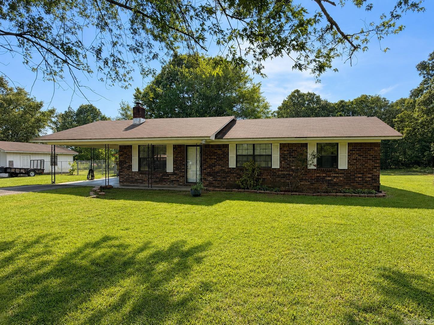 Sitting on 2.85 beautiful acres, this 3 bedroom, 1.5 bath home offers peaceful country living with plenty of potential. The property features a flat lot with mature trees, a small pond, and a detached garage/shop creating the perfect setting for someone looking for space and privacy to sit on their back porch. Inside, with some vision and work, it could easily be transformed into something special. Whether you’re looking for a fixer-upper, investment opportunity, or a place to make your own, the gorgeous land and setting make this property worth seeing. Contact today to schedule your showing!  Listing photos have been digitally enhanced for brightness and clarity.