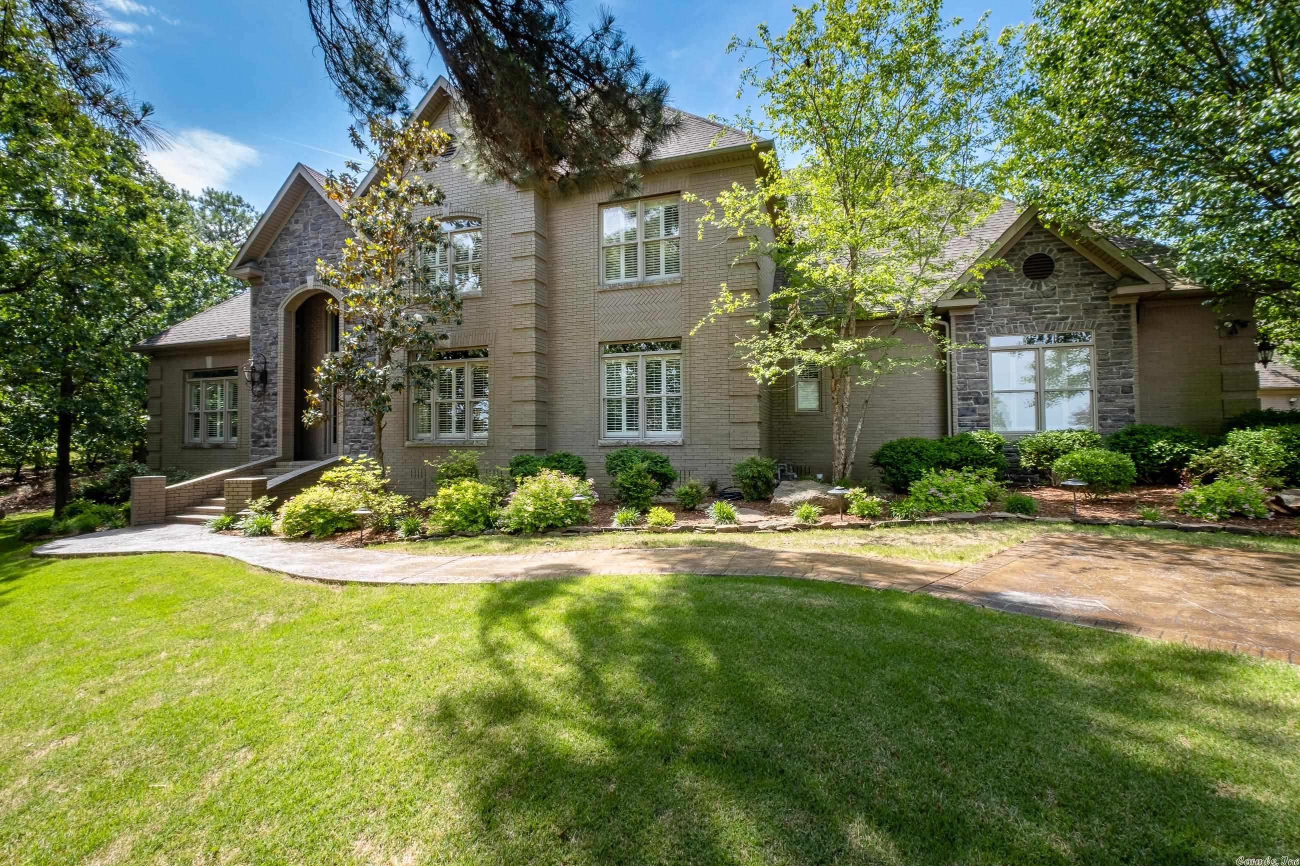 Truly Stunning custom built traditional w/ VIEWS of the River! Situated on a 2+AC estate sized lot & the perfect setting for entertaining as well as family living. Well thought out design showcasing beautiful flooring, tall ceilings, handsome millwork & gorgeous views. Main level has primary suite as well as large guest suite. 3 additional guest BRs, 2 BAs, family Rm & Game Rm upstairs. Entertain & play in the fabulous pool along w/ the 547 SF poolhouse (not included in SF). Spacious 4 car garage. Remarks.