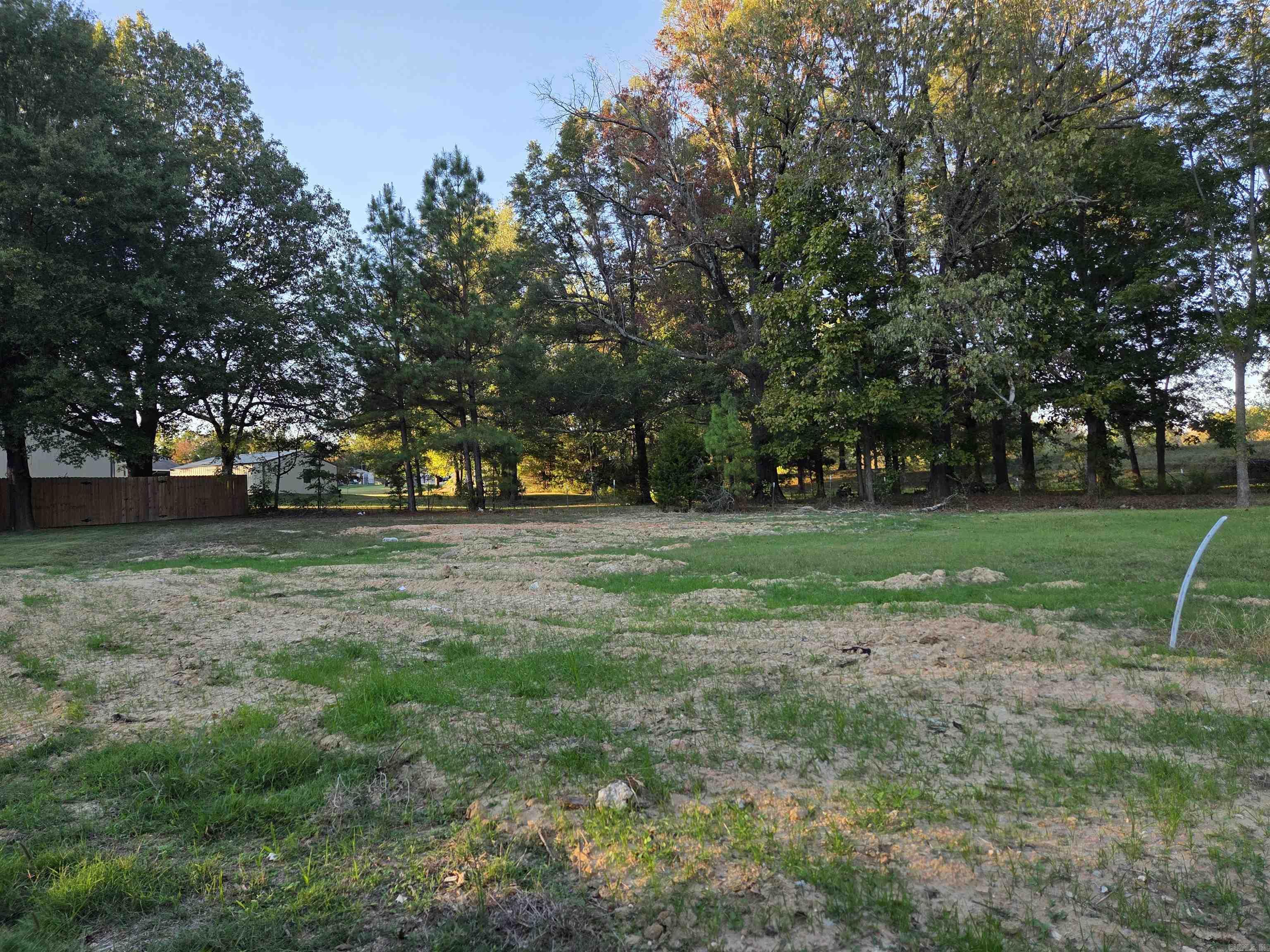 Tucked away at the end of a quiet cul-de-sac, this spacious vacant lot offers an ideal setting to build your dream home. Enjoy peace, privacy, and a true neighborhood atmosphere with minimal traffic and ample space for outdoor living. Create the backyard, garden, or patio you’ve always envisioned, surrounded by a serene natural setting. Conveniently located near town, schools, and shopping, this property provides the perfect balance of accessibility and retreat-like living. A rare opportunity to design the home and lifestyle you’ve been dreaming of. Agent owned.