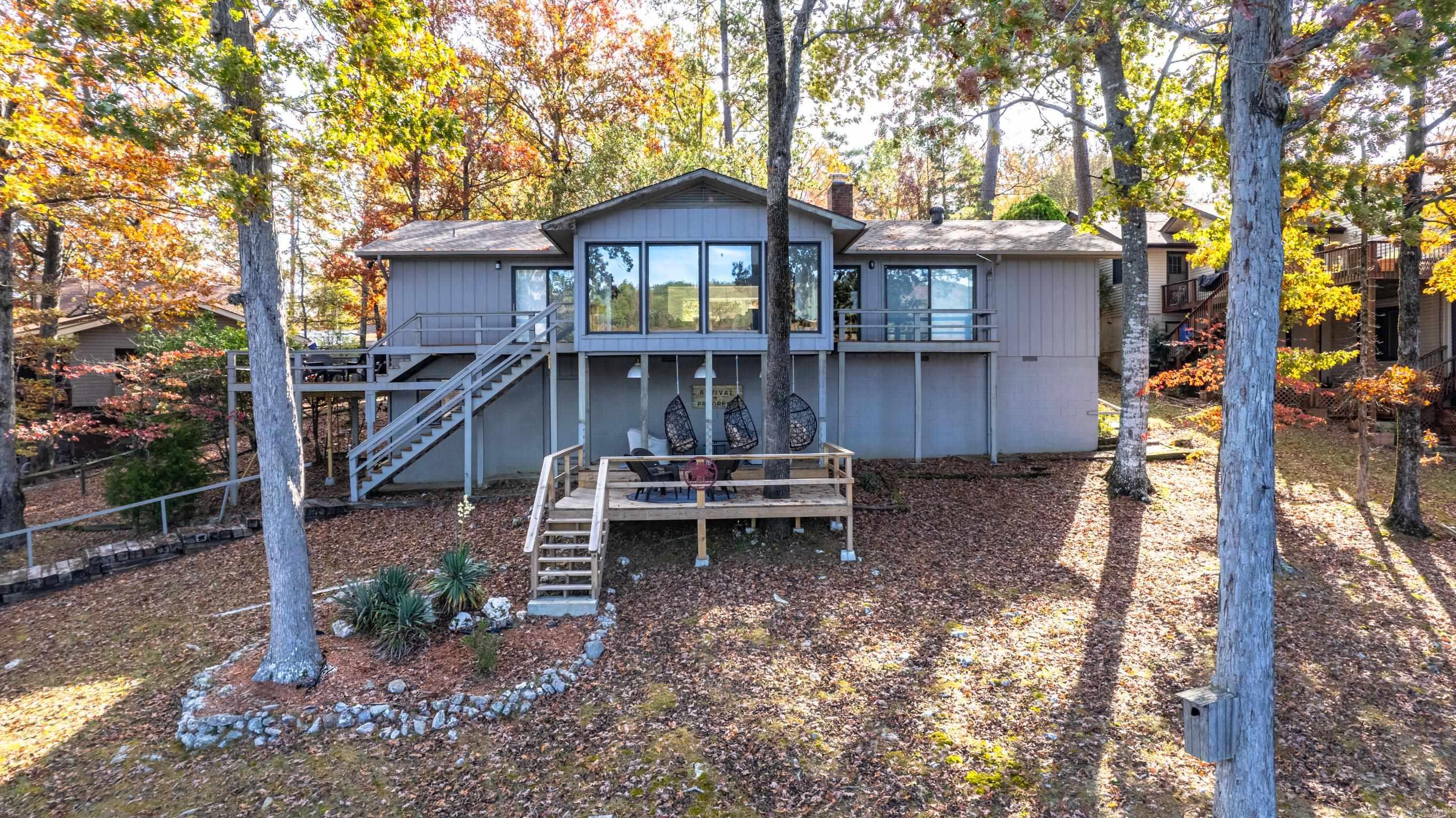 This Cortez lakefront home is full of charm and beauty from the inside out. It has been completely updated and meticulously cared for. Your new favorite spot for relaxing is sure to be the four seasons room with expansive lake views on all 3 sides. The open floor plan, spacious living areas and gorgeous views make this house ideal for hosting. 3 bedrooms and 2 full baths all on the main level. The basement has been finished out to provide a 4th bedroom and full bath. With its own outdoor access, this would make a fabulous rental or guest space. Other favorite features include Woodburning FP, Samsung appliances, granite countertops, separate laundry room, 3 outdoor decks and a covered boat/swim dock. Updates include NEW ROOF 2023, New HVAC 2023, new washer and dryer, ceiling fans, lights, shades in bedrooms, dehumidifier in crawl space and new ductwork in finished basement. Furniture is negotiable. Don't wait to schedule your showing on this one!