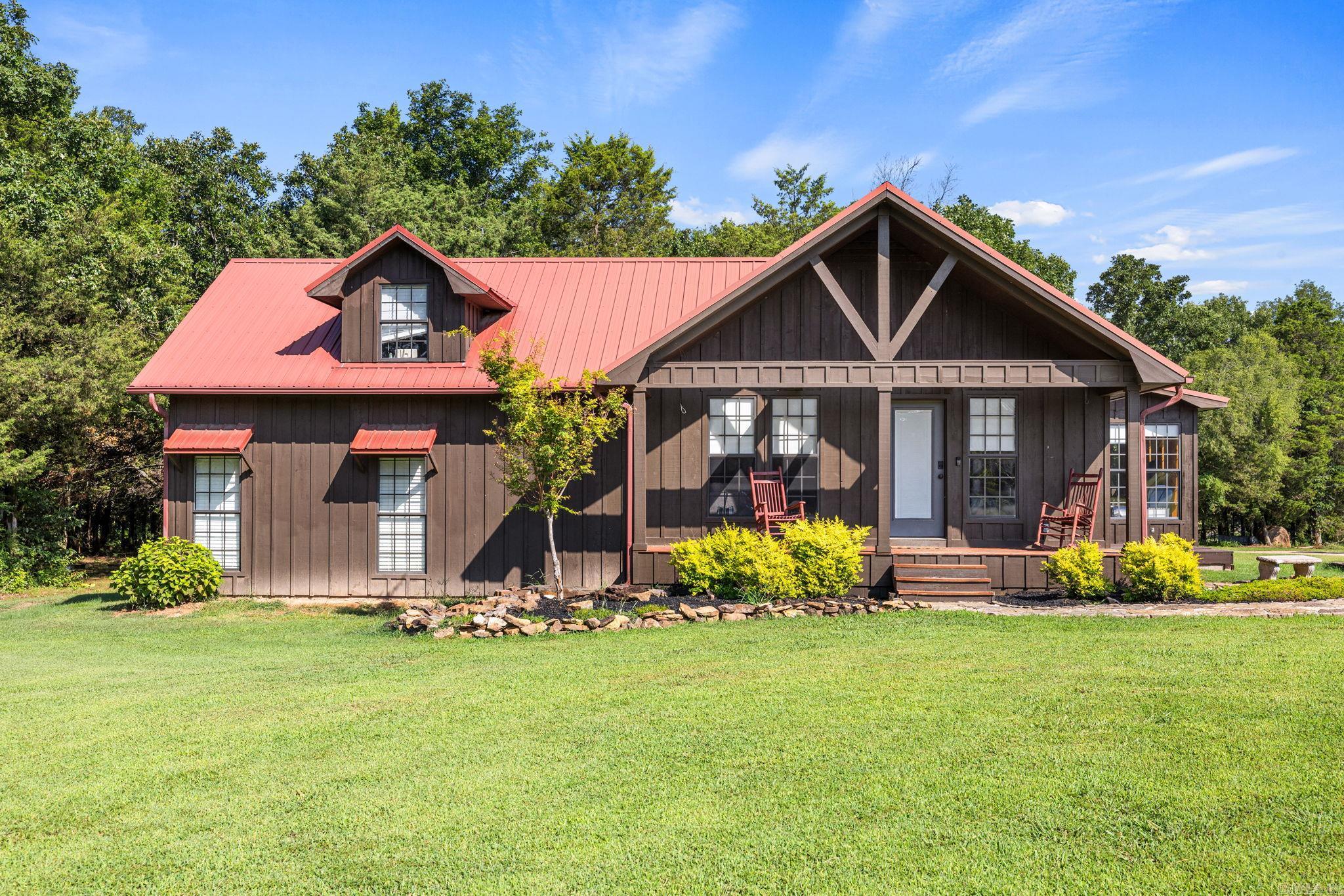 20 Acres!! What?  3 bedroom, 2 bath home, that is really cute What?  25 x 30 barn with concrete floors and small office area  What?  the land, the land is perfect just to sit and enjoy or to put your own animals on the pond.  What?   this property is ready for you, make your appoitment today.