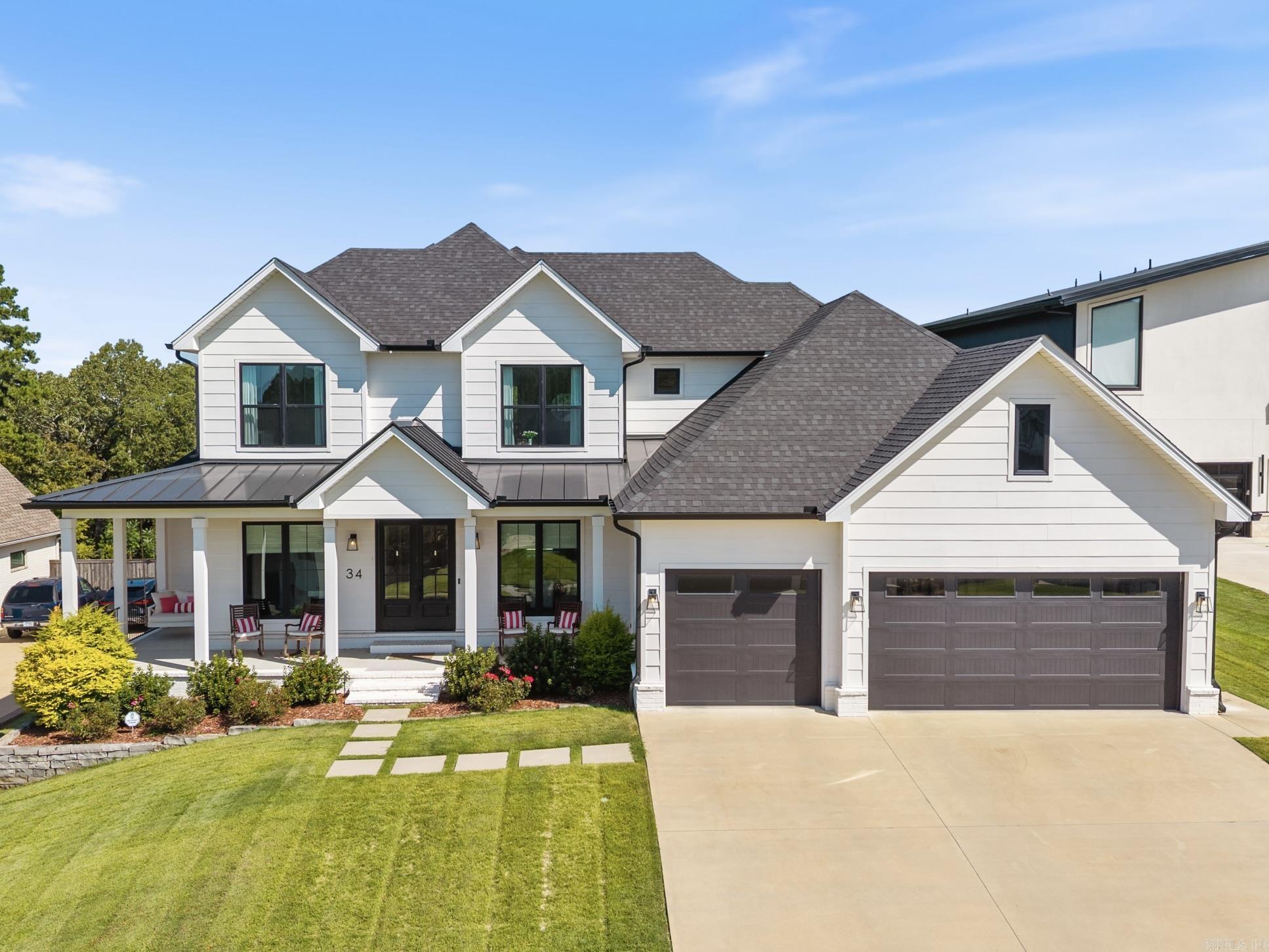 Check out the video/virtual tour! Gorgeous custom two-story home in Falstone with a fabulous layout and designer finishes throughout! The main level features an open floor plan w/ a home office including built-ins & glass French doors leading to foyer, a spacious dining room open to the den & a stunning den/family room w/ tall ceilings, a gas fireplace, custom trim & built-ins. The gourmet kitchen offers double ovens, a pot filler, gas range, quartz countertops & breakfast nook. Additional main level features include a huge walk-in pantry, laundry room w/ sink, mudroom cubbies, half bath, private primary suite & guest room w/ ensuite bath. The primary suite features a spa-like bathroom w/ soaking tub, double sinks, ample storage & a fabulous walk-in closet. Expansive windows across the back of the home showcase the covered back porch w/ fireplace & private backyard. Upstairs includes a large bonus room w/ half bath & two bedrooms connected by a Jack-and-Jill bath. Convenient location near shopping, dining, schools & more! Other features include: wraparound front porch, Hardie board exterior, 3-car garage, security system and over $20K in custom window treatments! See agent remarks.