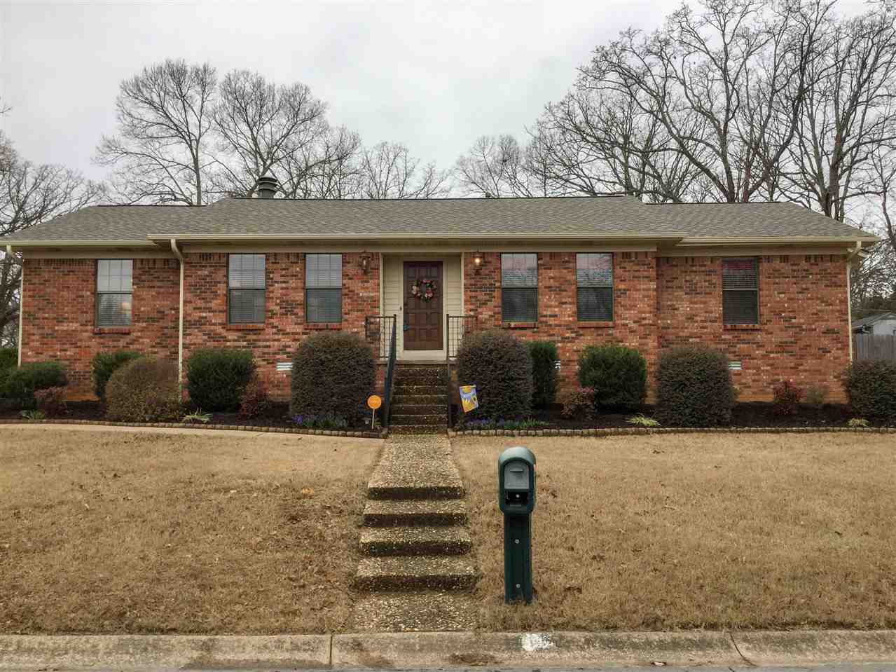 Move-In ready and updates galore! New tile and carpet, brand new roof and updated bathroom vanities and tub surrounds. Other great features include gas range, granite in kitchen, extensive landscaping all located on a spacious lot close to schools!