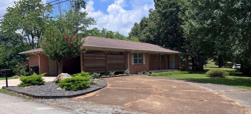 Charming, move-in-ready brick ranch style home offering a perfect blend of classic curb appeal with a convenient location.  Close to everything.  Established shade trees and ample parking are part of the package. The kitchen has bright cabinetry beautifully contrasted by dark countertops.  Stainless-steel appliances, including a gas stove, dishwasher and new refrigerator complete the kitchen.   Spacious open-concept eating area open to the kitchen and living room.  The living room opens onto a large deck with multiple use areas.   Three bedrooms range from comfortably cozy to spacious.  OWNER'S SON HOLDS AN ACTIVE REAL ESTATE LICENSE, HAS A VESTED INTEREST, AND IS CO-LISTING AGENT ON THIS PROPERTY