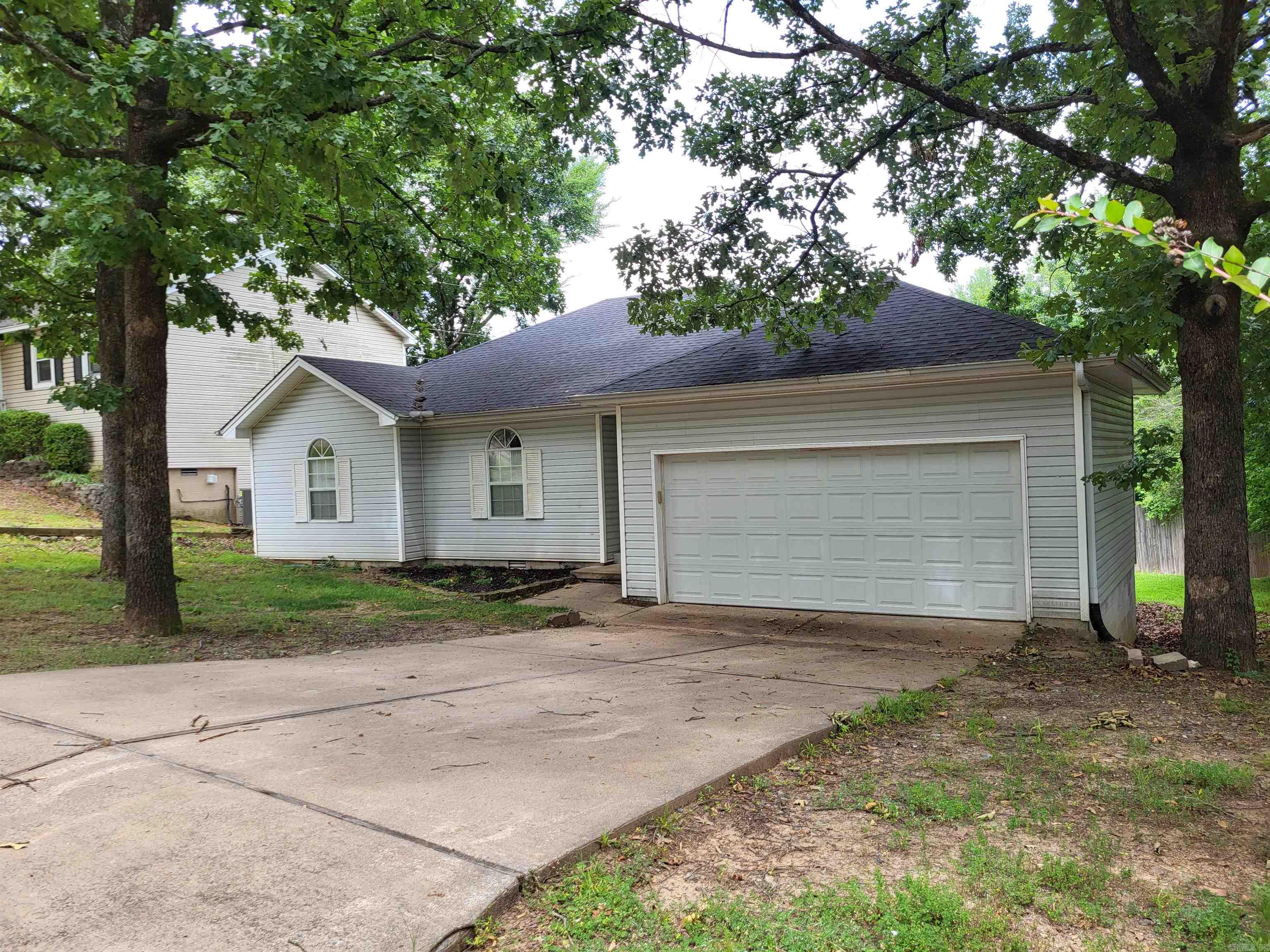 Here's your chance to own a beautiful newly remodeled home nestled in the quiet Park Hill West subdivision. This 3 bed 2 bath home has a grand back deck to relax on and enjoy your backyard bbqs. It has a spacious 2 car garage. The roof and HVAC were replaced in 2023 and the whole home has fresh paint and new flooring. The refrigerator,  washing machine, and dryer come with the home. It is conveniently located near shopping, restaurants, and a paved bike/walking trail. Call today for more details!