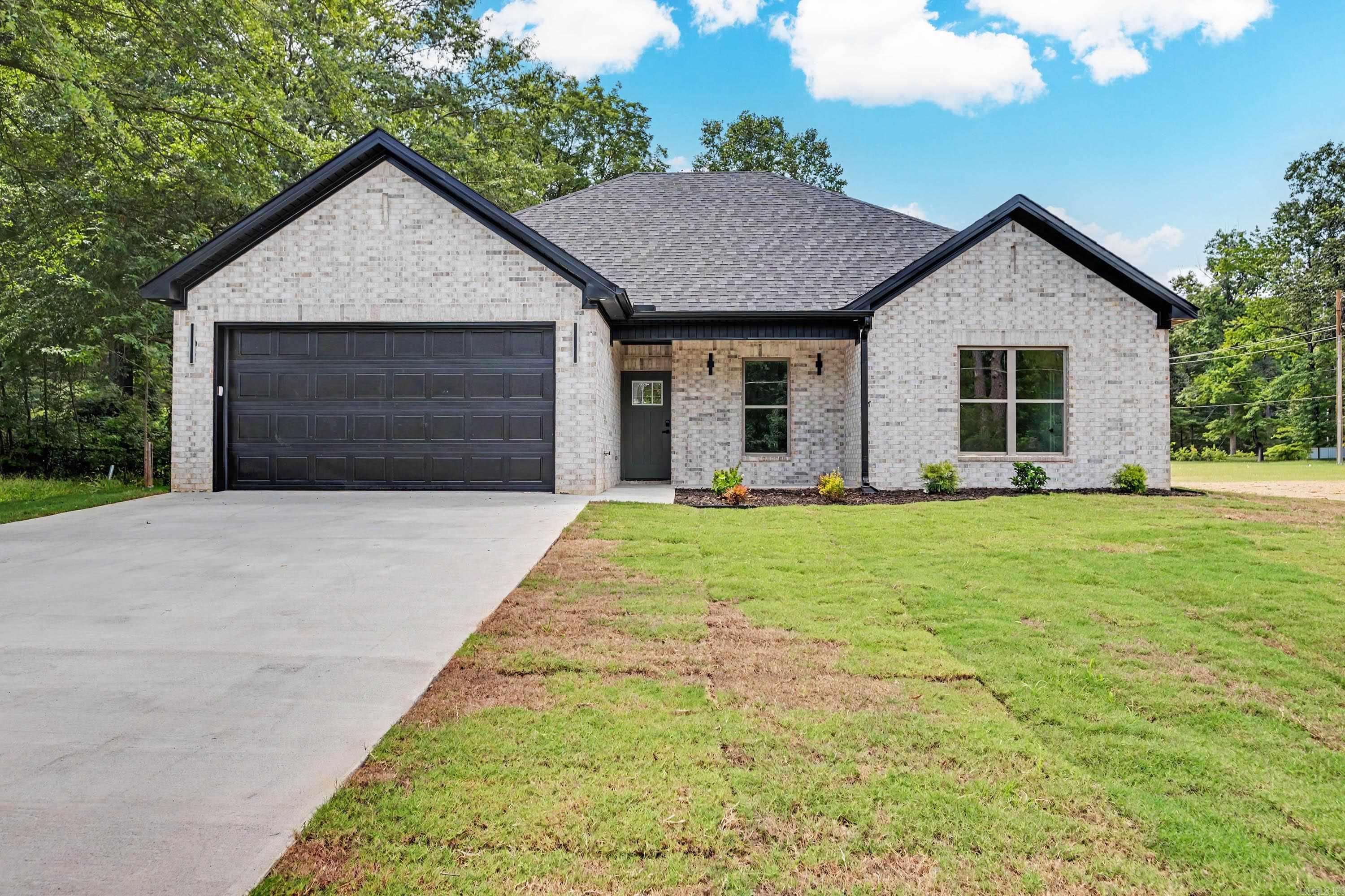 Welcome home to this beautiful new construction in the Harmony Grove School District!  Offering over 1,700 sq ft, this 4-bedroom, 2-bath home features an open floor plan that's perfect for family living and entertaining.  The kitchen boasts granite countertops, a pantry, and opens to the spacious living area.  The living features a stunning vaulted ceiling and a cozy electric fireplace.  The private primary suite features a custom, 9-foot tray ceiling, creating a beautiful, relaxing retreat.  Durable LVP flooring throughout the home, and a separate laundry room adds convenience and functionality to daily living.  Ideally located near the Harmony Grove schools and the DG Grocery store, this home offers the perfect blend of comfort, style and accessibility.  Schedule a tour today and take advantage of the opportunity to make this beautiful new home your own! *AGENTS SEE REMARKS*