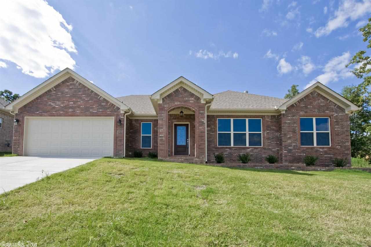 Motivated Seller! Priced to sell! Really nice floorplan. You will love! Granite counter tops! Fantastic stained cabinets! Large island w/breakfast bar!HUGE laundry room w/a desk~perfect for office area! Corner wood burning fireplace located in oversized family room! Split floor plan w/ large walk-in closet in master bedroom. Jetted tub w/ his & her vanities. This is a must see! Sq ft approx., please measure. See agent remarks...