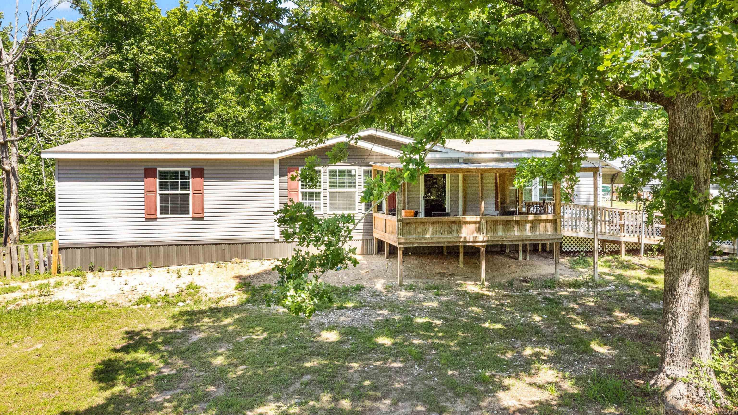 Tucked away on approximately 3 acres, this 3 bed 2 bath home is positioned overlooking its pond and gently rolling hills. Conveniently located about 15 minutes from Benton and around 20 minutes to Little Rock via Congo-Ferndale, enjoy the simple country life, not too far from town. With carport parking, covered deck and walk-ramp, and additional RV parking setup, this could be your next home! Book your showing today!