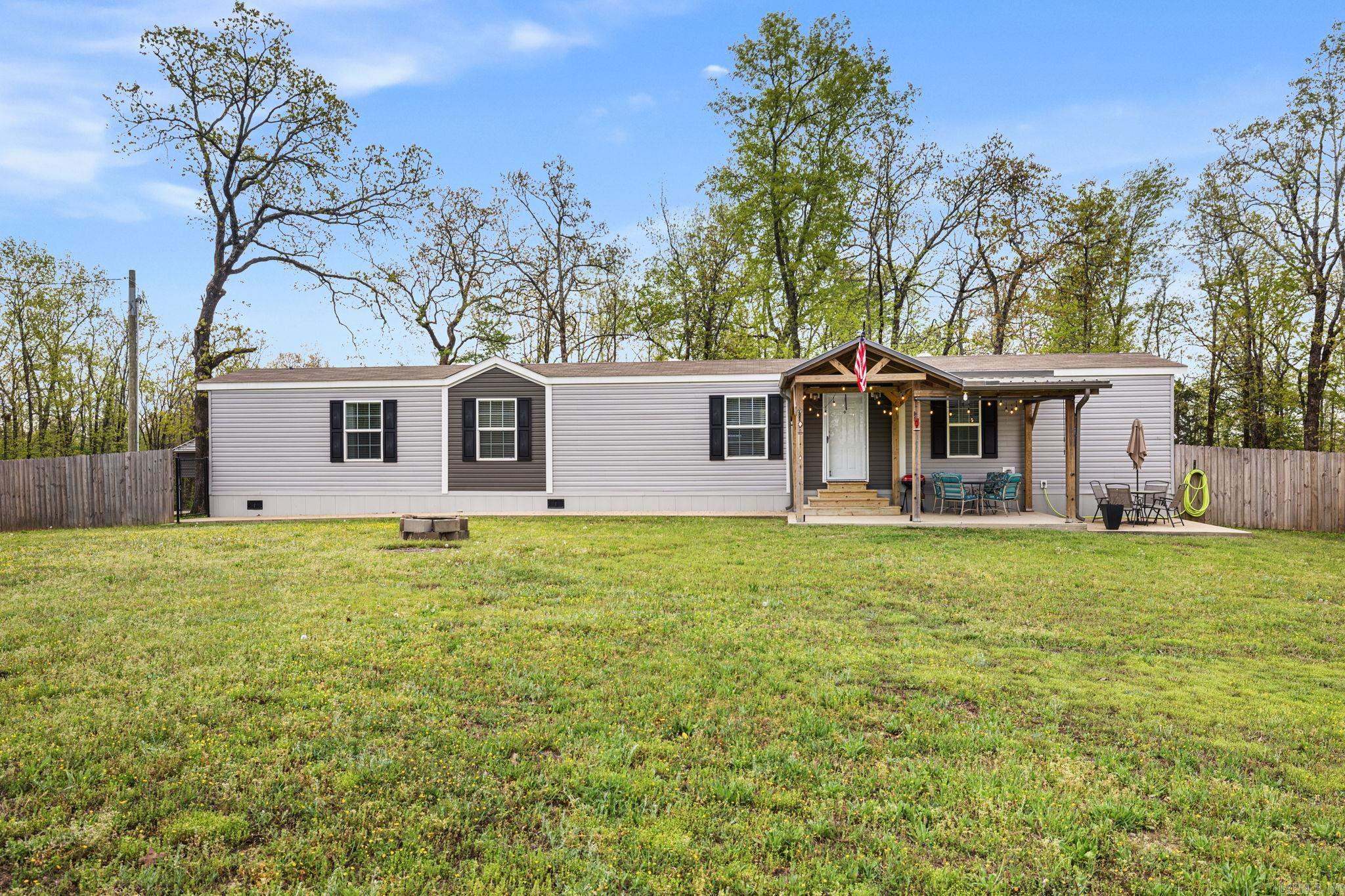 "You can't get land without blowing the budget?" Well, here's your proof that you can. This one sings a 90s country song with a modern floorplan- sitting on 1.51 acres just outside the hustle and bustle, this property offers something that's getting harder and harder to find—space, quiet, and room to breathe. The sellers say their favorite part is the abundance of natural light and just how quiet it is outside—and one visit makes it easy to understand why. And here's the bonus buyers have been waiting for: this home is eligible for government-backed financing, opening the door to more opportunities than many acreage properties can offer. Did we mention the detached storage shed?? You need to move FAST, she's rare, ready and REAL. Schedule your showing now! See agent remarks!