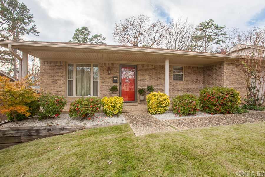 Amazing one-level brick home boast a huge kitchen recently remodeled with slab granite, new backsplash, stainless appliances, custom cabinets and wood floors. Newer carpet, newer windows, fresh paint, HVAC (15 SEER), sprinkler system, alarm and beautiful landscaping. Den has fireplace and overlooks deck and fully fenced backyard. This is a must show!