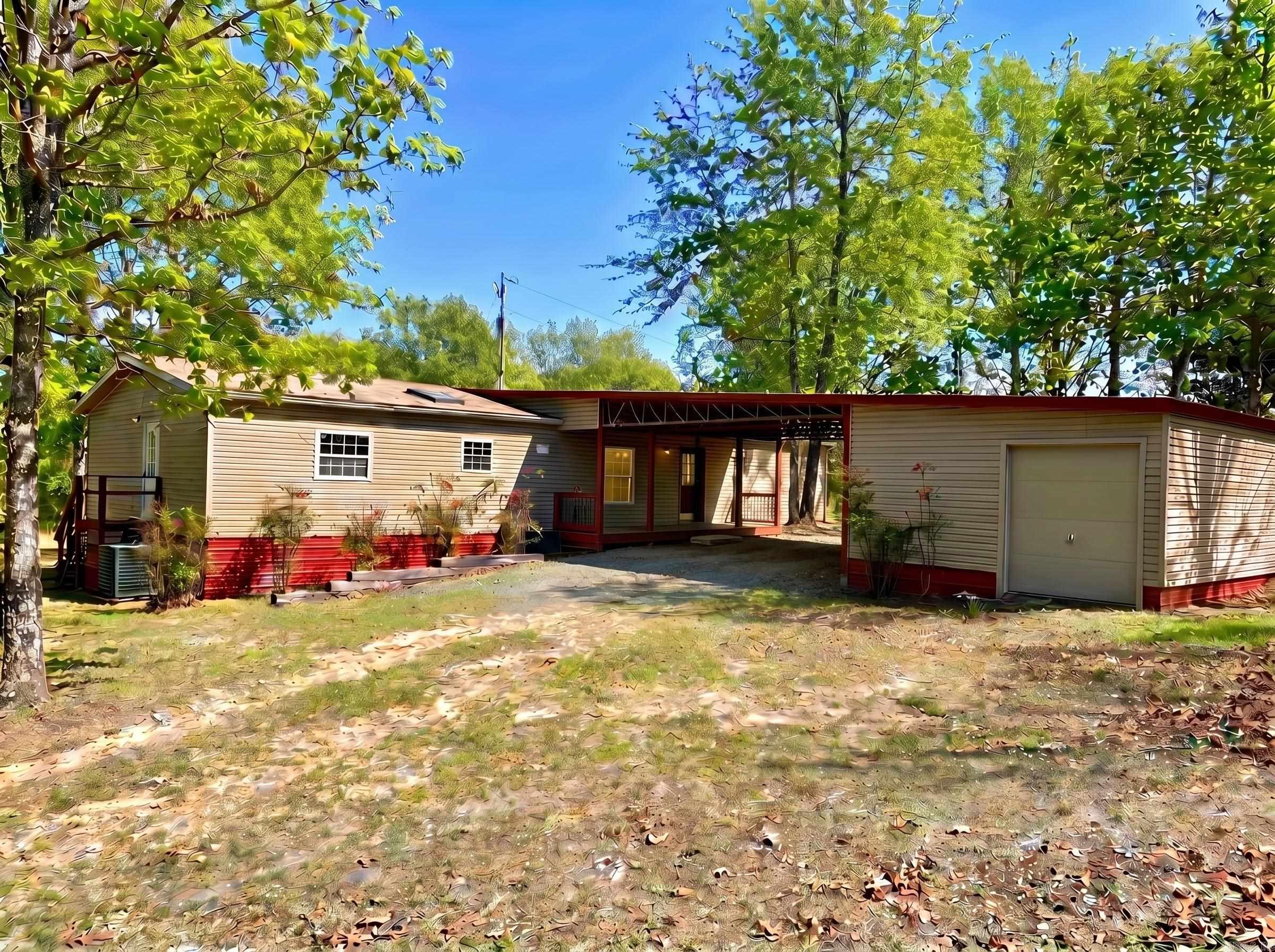 Nestled on 4 beautiful acres, this refreshed 3 bed, 2 bath mobile home offers comfort, charm, and room to roam. The home features a spacious refreshed kitchen with a butcherblock topped island and re-surfaced countertops as well as upgraded appliances, a cozy fireplace, and a mudroom/pantry for added convenience. A brand new HVAC has been installed as well as new carpet and fresh paint throughout for added comfort and ease. All outlets have been upgraded throughout the home as well. An attached workshop with full electric provides excellent space for projects or storage. Outside, you'll find a partially covered back deck perfect for enjoying the peaceful scenery. Dreaming of a hobby farm? This is what you've been looking for! Recent survey already on file. Please Note..some rooms are virtually staged.
