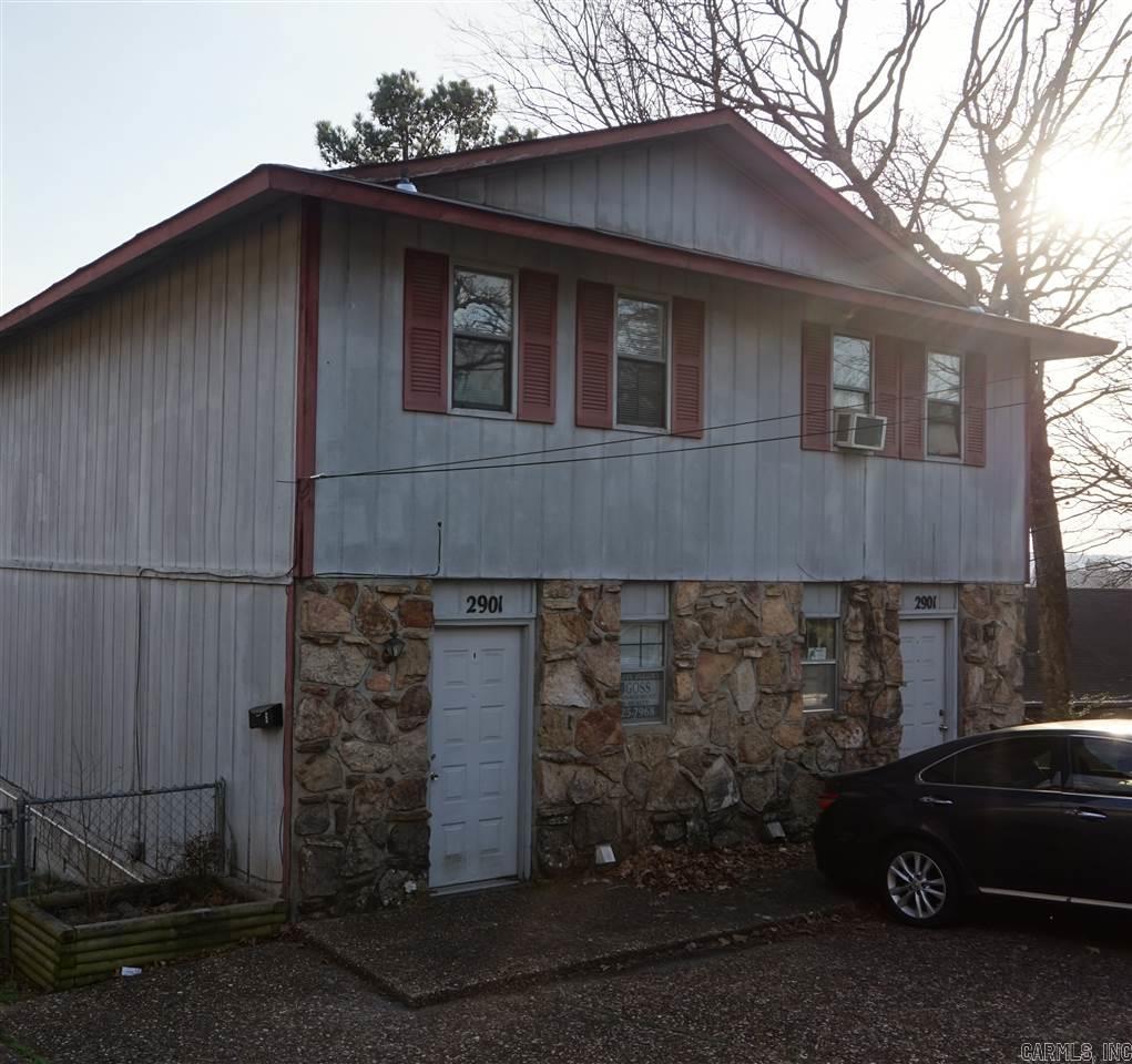 This townhouse has a private deck on the back with a wonderful view of downtown Little Rock. It is not actually on JFK Boulevard, but the back overlooks the start of JFK. Inside it has central heat and air, window coverings, ceiling fans, carpet and tile floors, and washer/dryer connections. The kitchen is furnished with electric stove, refrigerator, and dishwasher. The tenant pays gas, water and electric. One small pet may be accepted with owner approval, and this is a non-smoking property.