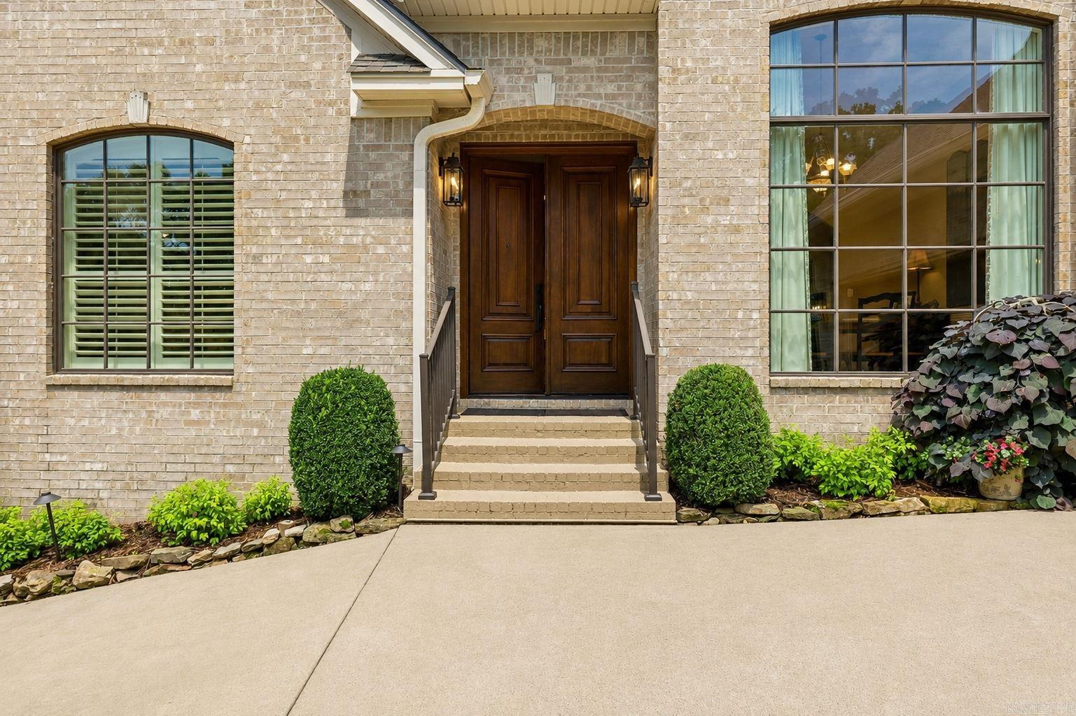 Beautifully presented and offering exceptional quality updates, and a comfortable layout designed for everyday living and easy entertaining, this one-level home offers exquisite curb appeal. Set in a cul-de-sac, this incredibly well-cared-for home welcomes you with solid mahogany Andersen double front doors, Andersen windows, warm interiors, generous natural light and inviting living spaces. The kitchen is a standout with Taj Mahal granite counters and glazed cabinets that add timeless style and function. The main living areas offer wonderful flow, with room to gather, relax, work from home, or host family and friends, while the bedrooms provide comfortable private retreats. Important recent updates add both beauty and, for peace of mind, a Whole-House generator. Outdoor living features professionally installed landscaping & lighting plus a lighted pergola for casual dinners or weekend entertaining. Conveniently located near shopping, dining, schools, parks and all the best of West Little Rock, this home combines location, livability, charm and thoughtful improvements in a highly desirable setting.  AGENTS, see Associated Documents for List of Updates