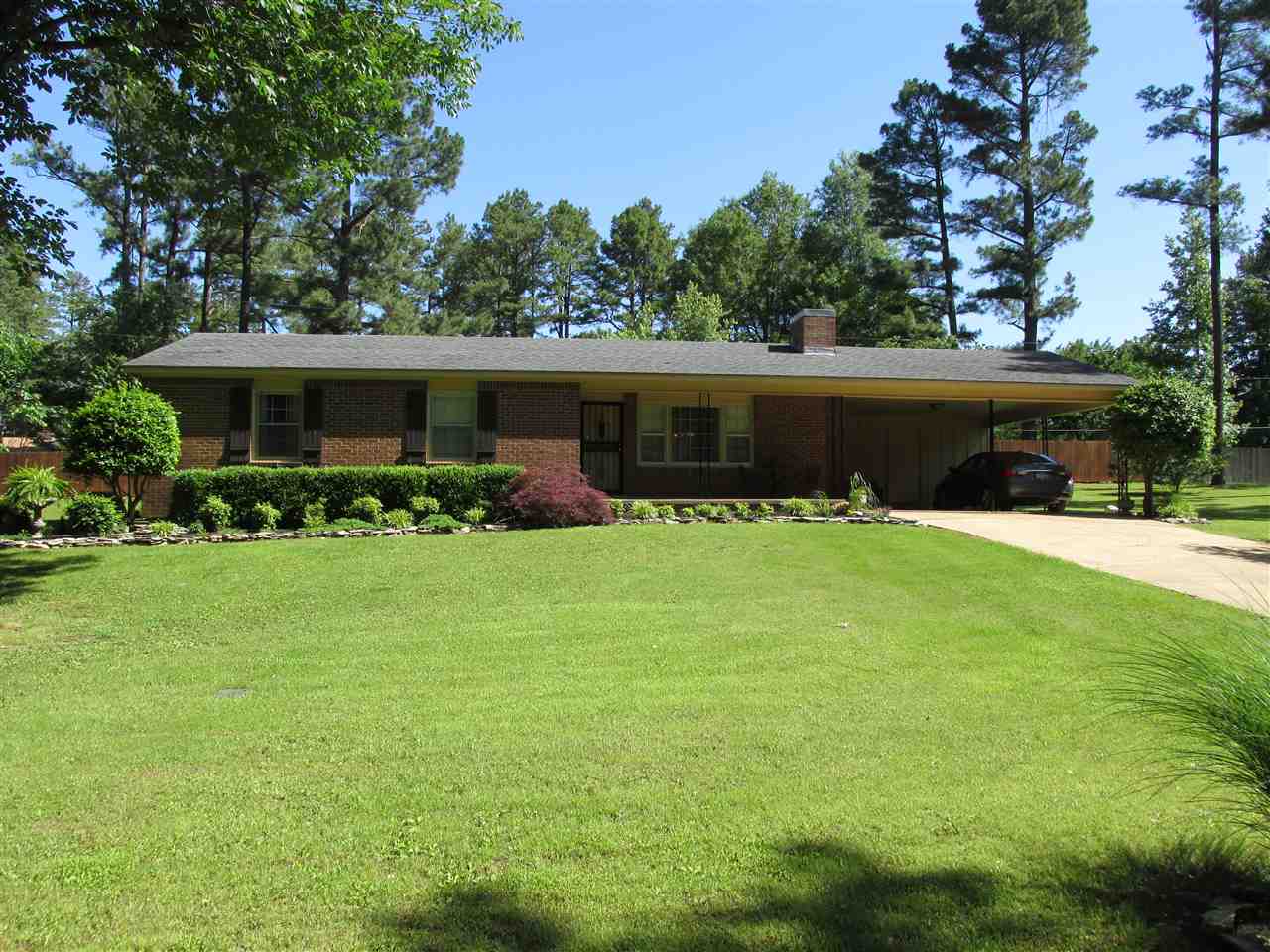 Move in ready 3 bedroom, 2 bath home!  Sits on almost half an acre in city limits.  New flooring and paint. Refrigerator, washer and dryer included.  Great for first time home buyer!
