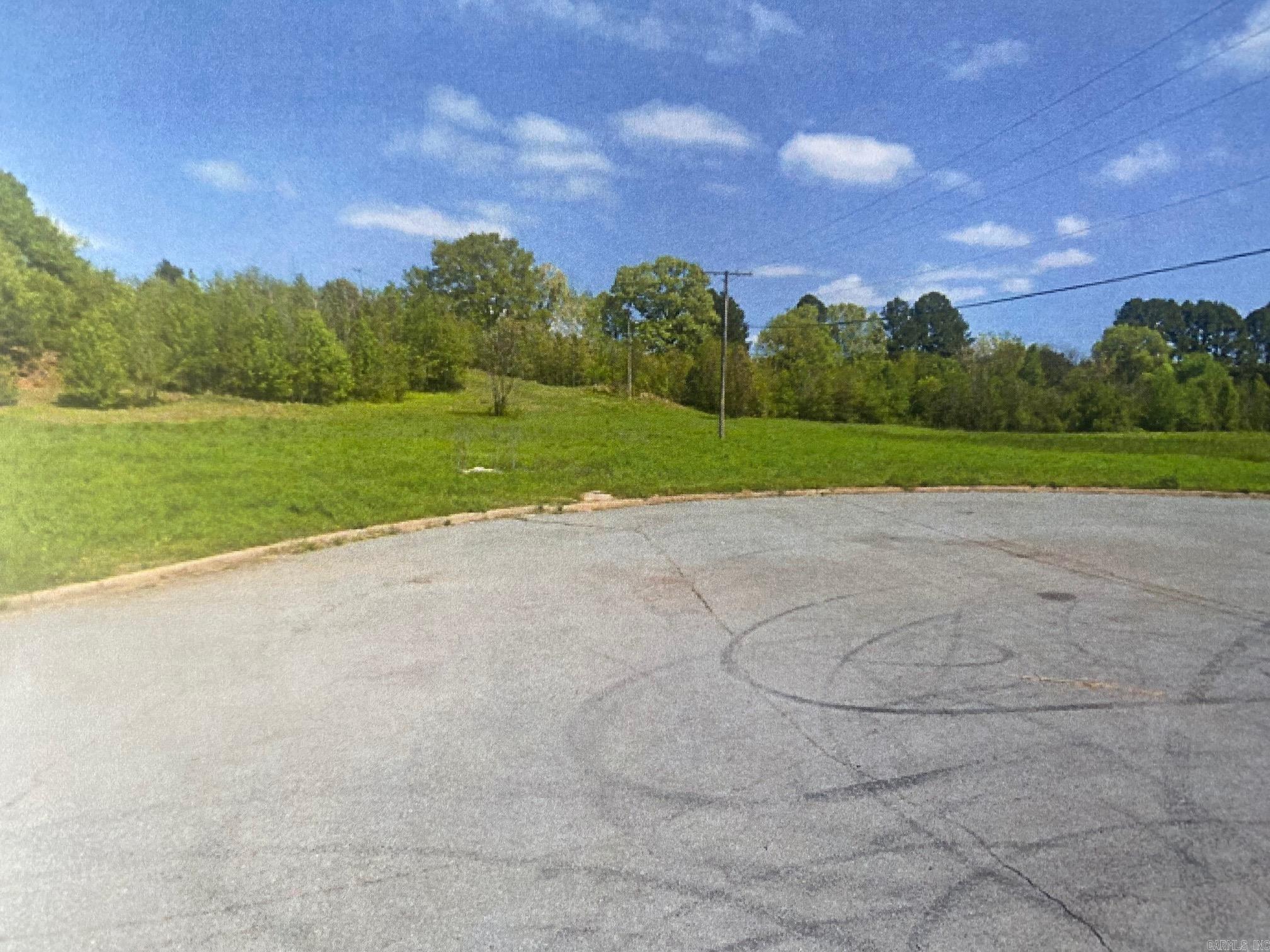 Excellent Commercial property at the East end of McCain Blvd. in Pulaski County, Ar. This property for Retail, Hotel and locations along with Commercial Distribution and Office Warehouse possibilities.  Sewer, water and electricity and gas are available to the site and the Seller will subdivide the property for purchaser's use.  Located in Pulaski County outside the NLR City Limits, this property is without zoning classifications.