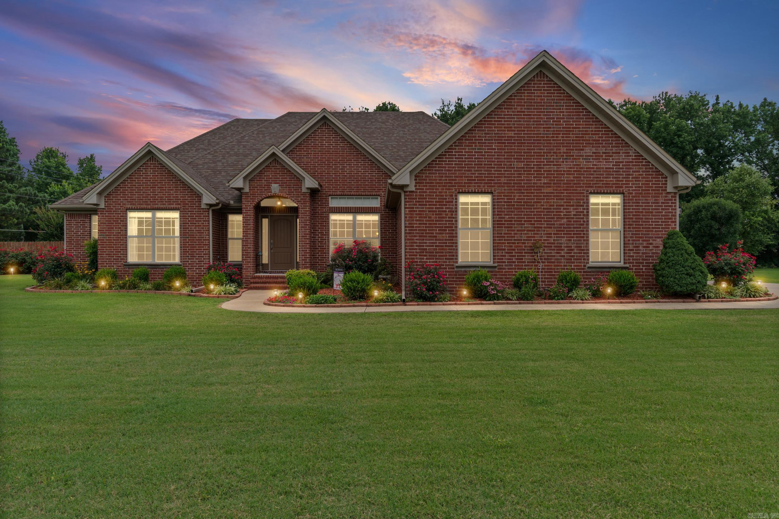 Don't miss your opportunity to own one of the very few homes in Searcy with a detached shop like this. Sits on a 0.92 oversized lot. No HOA.   This spacious 4-bedroom, 2-bath home offers 2,531 square feet plus one of the standout features buyers are searching for: a 26x34 detached shop with its own private driveway, garage access, 60-amp electrical service, and an additional 11x34 attic storage area. Features a new enclosed porch (276 SQFT) with Speckled Epoxy Floors.  Whether you're a car enthusiast, need a workshop, run a business from home, or simply want extra space for your hobbies, this setup is incredibly hard to find.  Outside, you'll enjoy a beautifully landscaped yard filled with mature blooming crepe myrtles that provide privacy, shade, and curb appeal. The property also includes an irrigation system already installed (just needs a new pump).  Even better, the expensive updates are already behind you with a NEW roof (2024), NEW HVAC (2024), and NEW high efficiency water heater (2024)—giving you peace of mind from day one. Existing irrigation system installed, (see remarks on details).   Schedule your showing!