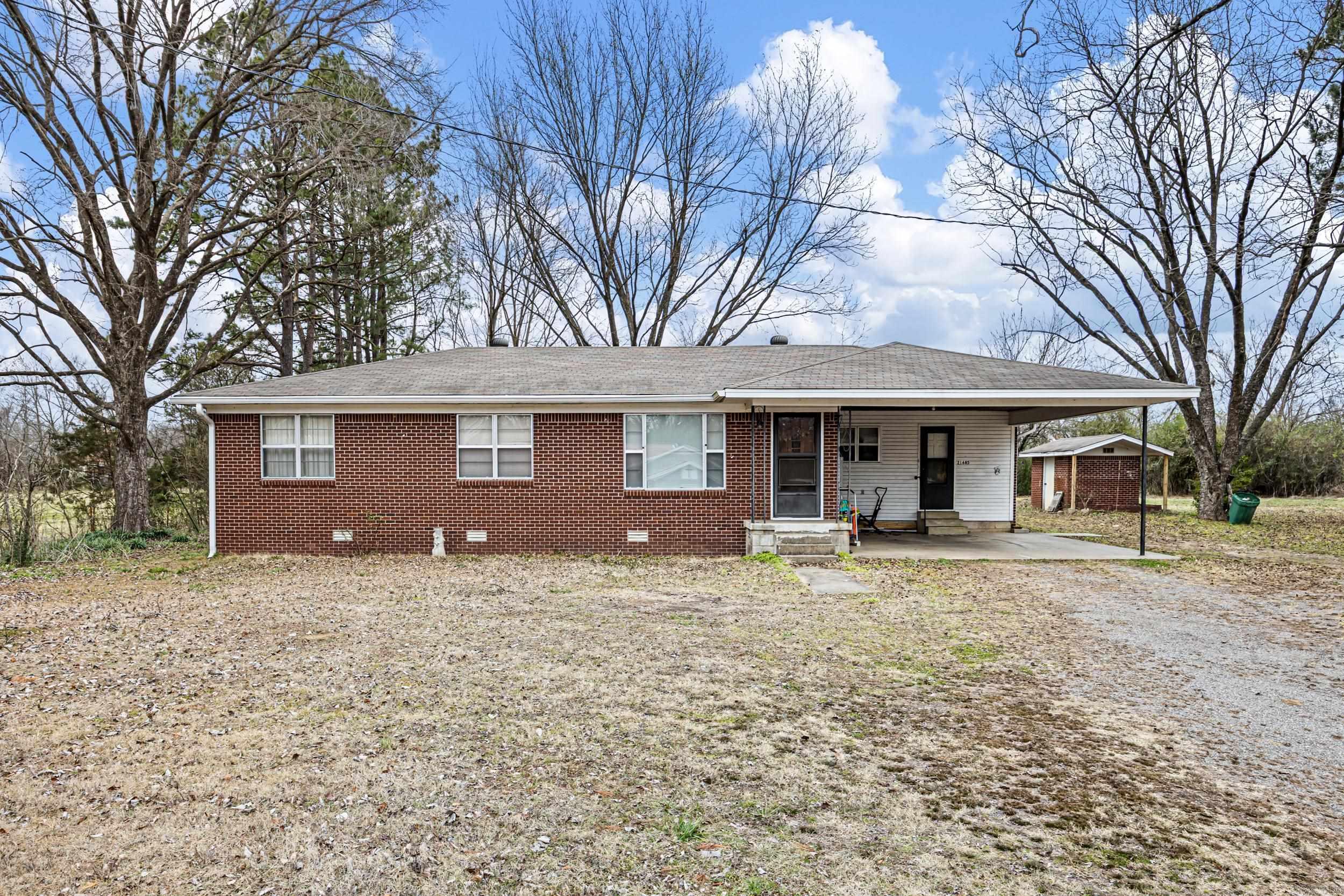 Imagine a peaceful 20 acre +/- homestead featuring a very well maintained brick 3 bedroom 1.5 bath home in heart of Yell Co. The 1584 sqft home includes a bonus living area, perfect for making family memories and entertaining friends. The main living area boasts a cozy wood burning fireplace and built ins. The beautiful rolling pastures contain 2 ponds and a barn for your cattle or equestrian needs. The central location is ideal for daily activities and with Petit Jean WMA a few minutes up the road it is perfect for outdoor enthusiasts. The farm has been in the family for generations and its now ready for your family to love it and carry on its legacy.