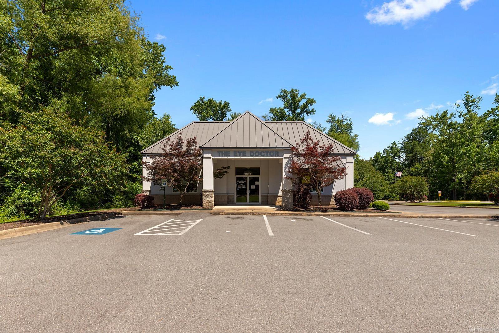 Prime commercial property offering outstanding exposure and endless potential. Situated on a 1.17-acre corner lot, the existing physician’s office is thoughtfully designed with 3 exam rooms, 2 triage rooms, dedicated lab space, 2 restrooms and a kitchen area. The spacious front office and reception area provide an inviting first impression with abundant showroom or waiting space options.  With 19 parking spaces and dual entrances, accessibility and convenience are unmatched for both clients and staff. Upstairs, the unfinished space offers incredible potential for future expansion, additional offices, storage or customized build-out opportunities.  Whether you’re expanding a medical practice, launching a professional office or seeking a highly visible investment property, this one delivers location, functionality, and room to grow. Additional acreage is also available next door.