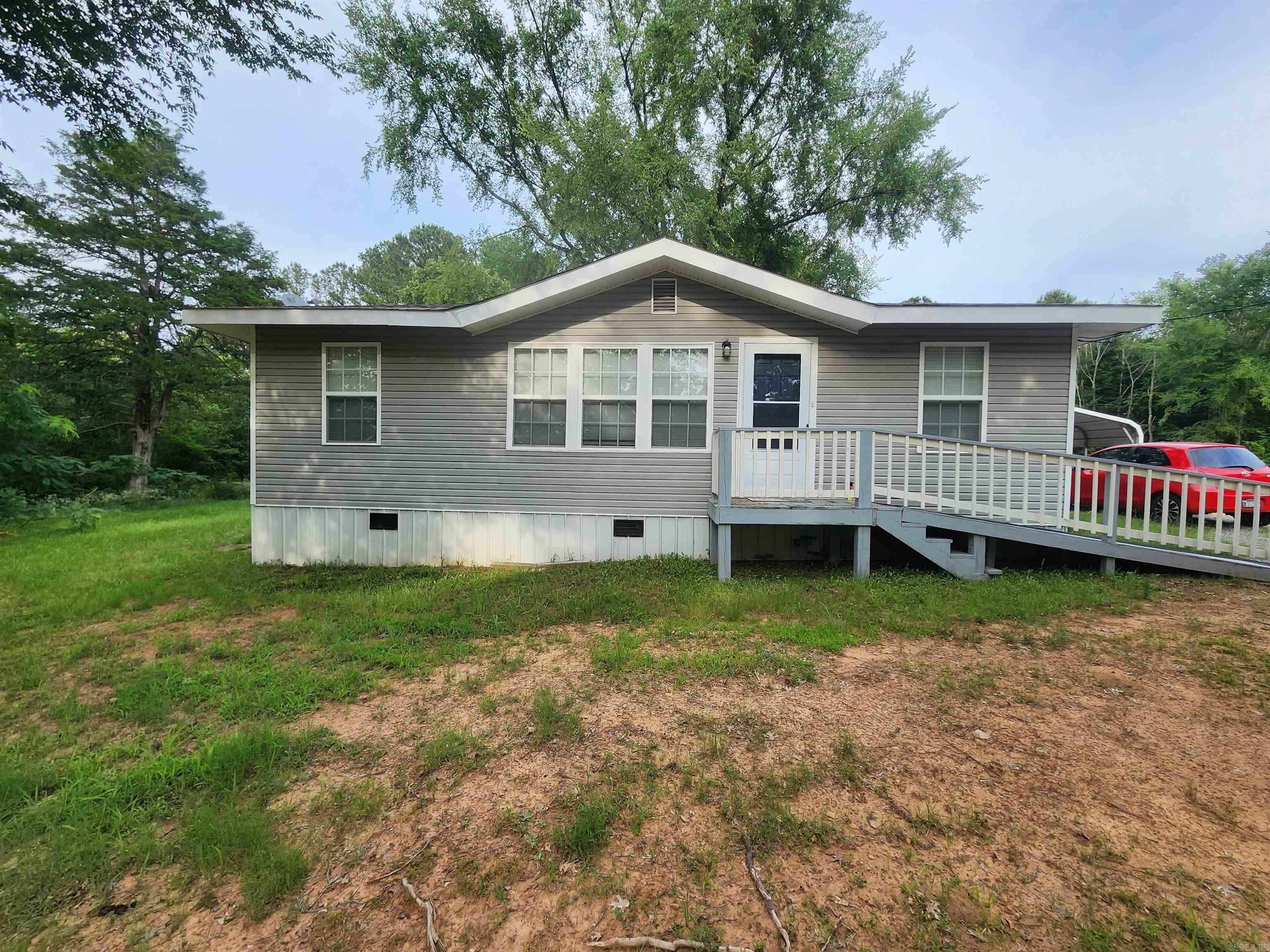 This 2 bedroom/2 bath home has been wonderfully maintained and is ready for it's next owners to call it home!  With the refrigerator conveying with an acceptable offer, this home is ready to be moved into and enjoyed.  With over the oversized space for a washer and dryer, an acre of land, handicap ramp and partially fenced-in back yard it's everything you could ask for.  The two nearly new storage buildings stay with the property as well!  Call today to see this one for yourself!
