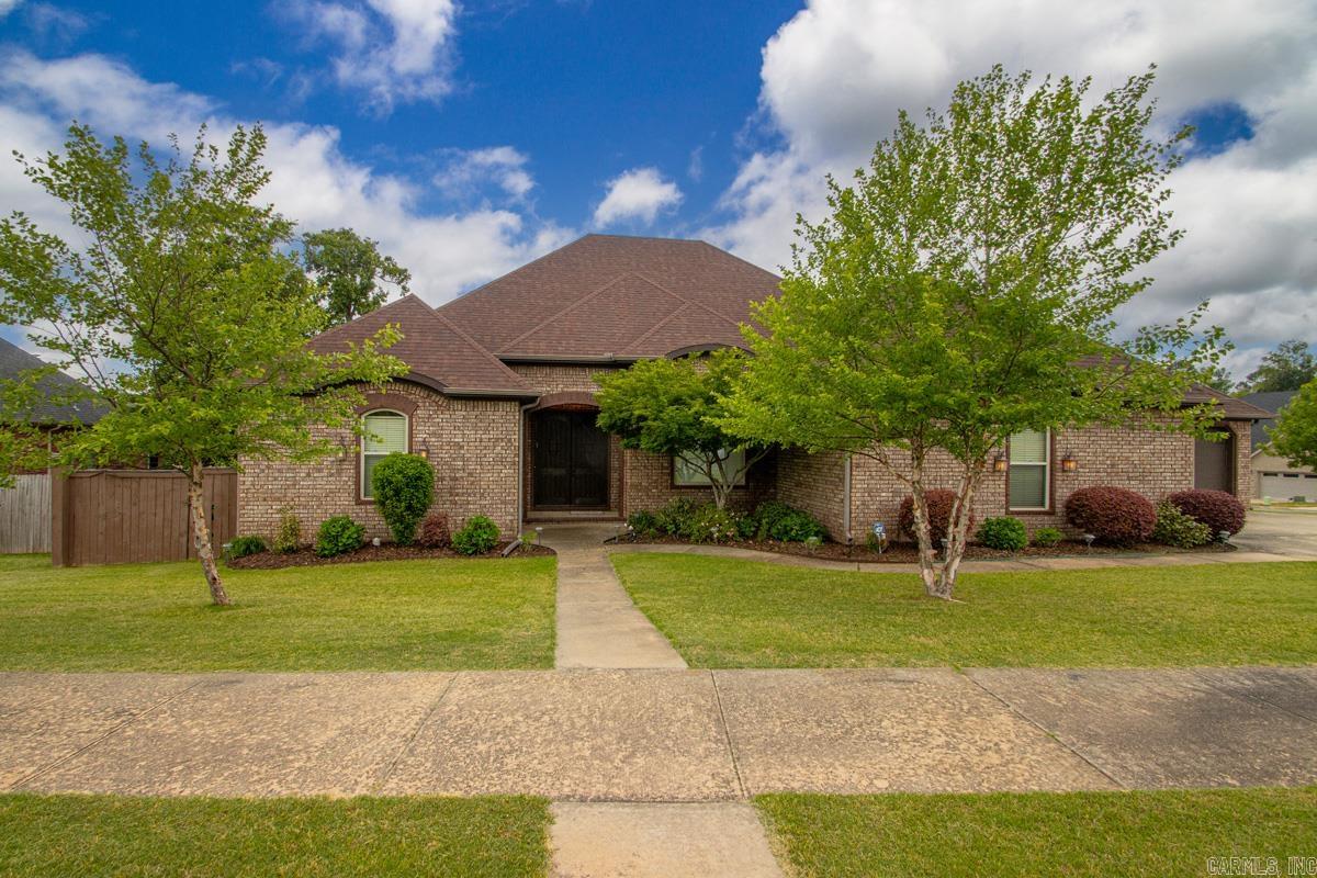 YOU MUST SEE THIS 4 Bedroom 3 1/2 Bath Excellent Maintained Custom Built Home! Level Lot! Large 3 Car Garage! Corner Lot. Fully Fenced Yard with Outdoor 15' x 18' Gazebo. Sprinkler System. Open Floor Plan with 2 Gas Log Fireplaces. One in the Living Room and One in the Man Cave. Separate Laundry Room with Sink. Stainless Steel Jenn-Air Appliances in Kitchen with 6 Burner Gas Cooktop and Convection Double Oven. Crown Molding Throughout. Large Pantry. Split Floor Plan. Large Primary Bedroom with Large Bathroom that Features a Jacuzzi Tub, Split Sinks, Walk-in-Shower and a Large Walk-through-Closet. The Opposite side of the House has Two Bedrooms with a Jack and Jill Bathroom. House has a Man Cave with it's Own Gas Log Fireplace. You Will Never Run Out of Hot Water with the 80 Gallon Rheem Marathon Water Heater. 12' Ceilings in Common Areas and 10' Ceilings in Bedrooms. Extra Storage all Through the House. Updates Include: New Roof in 2019, HVAC: New Condenser in 2019 and New Evaporator in 2021. All this House Needs is YOU. Schedule a Tour Today!