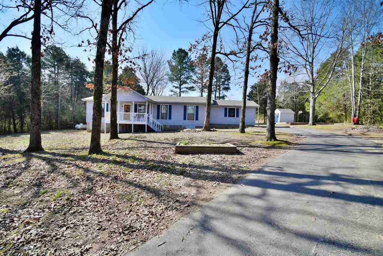 This house has lots of room for entertaining. You will enjoy the large covered front porch and the park like setting with lots of trees. Recent updates include all appliances, HVAC unit/thermostat, paint,   floor covering,outlets, and light fixtures and  New roof  was installed in 2015..Bonus room could be used as an office. New Storage building. Buyer has an option for Greenbrier schools but would need to apply by May 1
