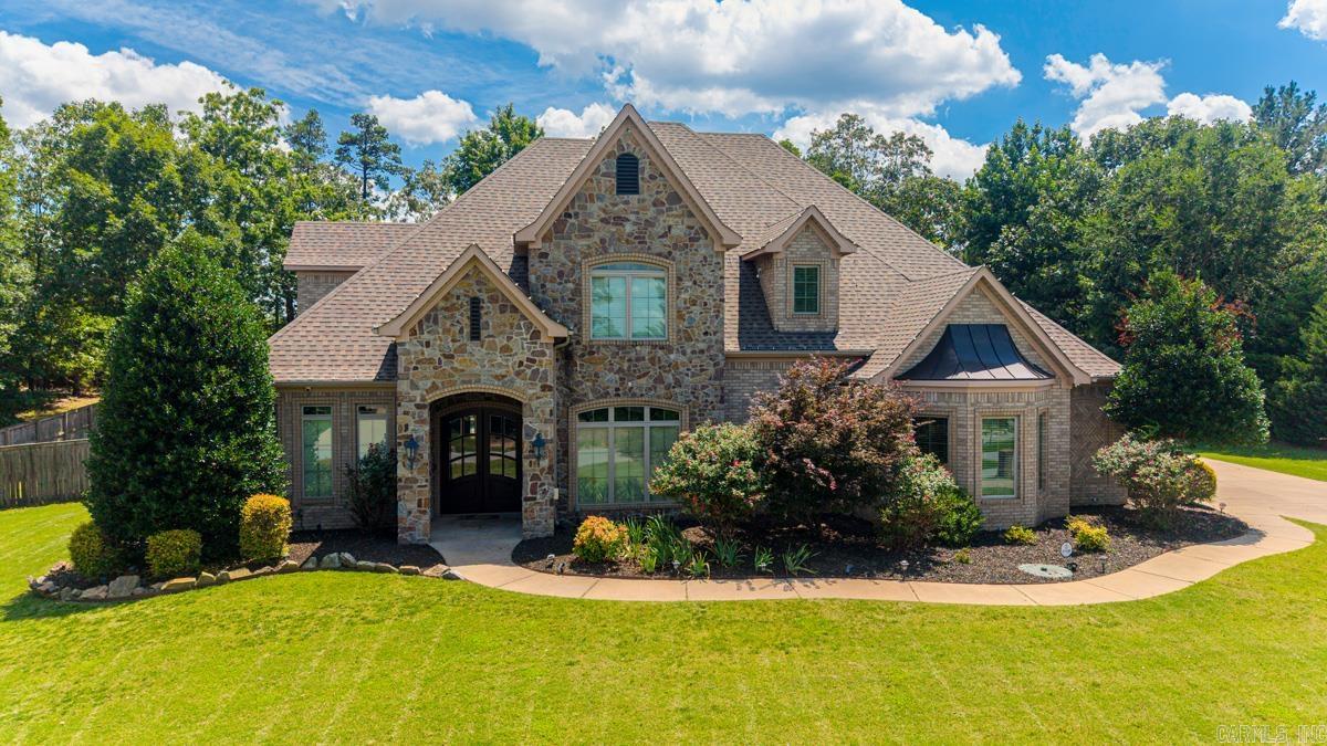 This custom Stonehill Estates beauty has all the space, style, and amenities today’s buyers are searching for. Featuring generous living spaces, stunning finishes, a chef-inspired kitchen, and room for everyone to spread out, this home was built for both everyday living and unforgettable entertaining.   The real showstopper? A resort-style backyard complete with an inground pool, making Arkansas summers something to look forward to. Whether it’s pool parties, family gatherings, or a quiet evening under the stars, this backyard delivers.  Located in a gated community with breathtaking views and exceptional craftsmanship throughout, this is the kind of home buyers remember long after the showing ends.