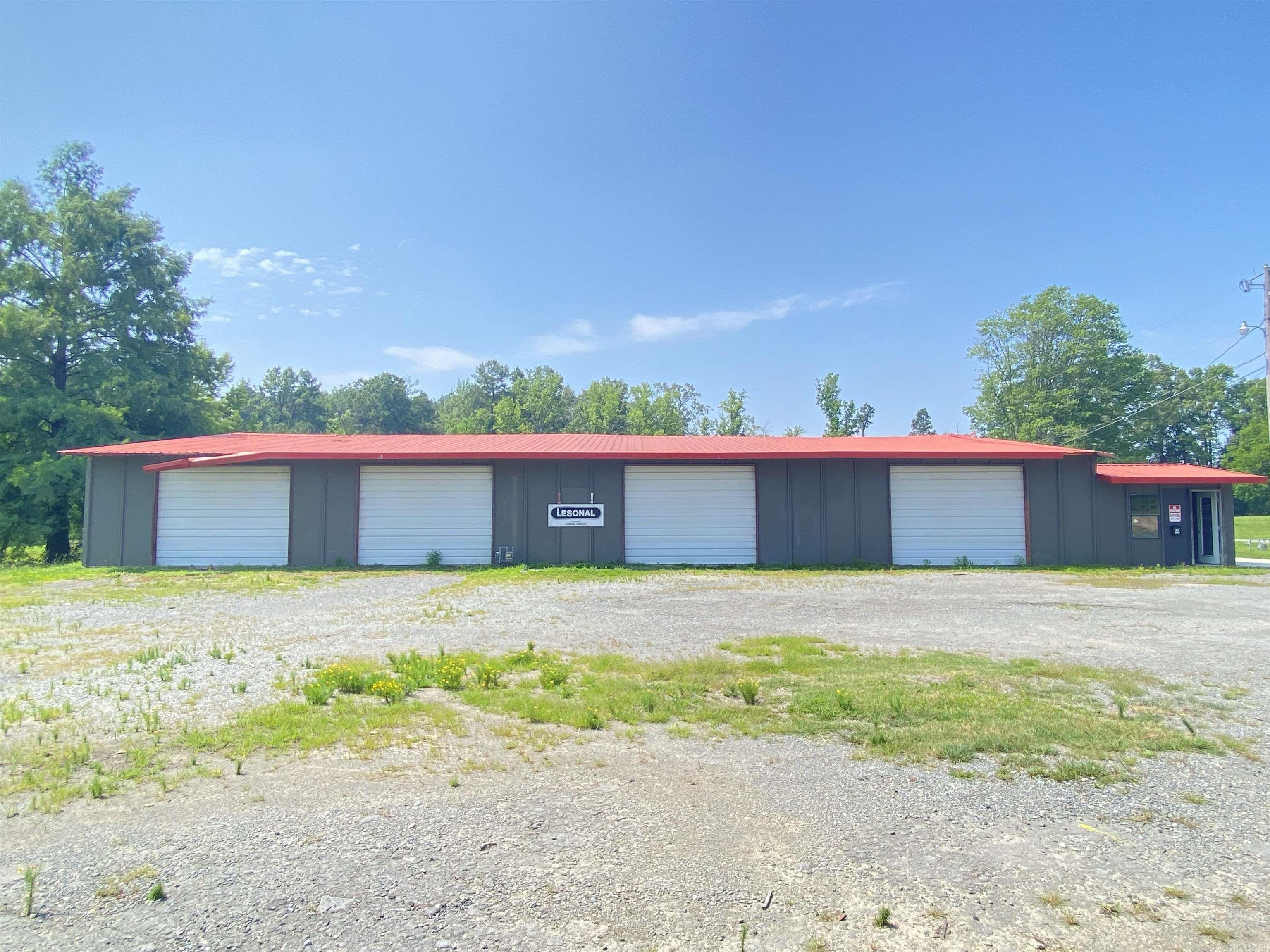 Former Lunsford Collision Repair Automotive Building For Sale, tons of potential with 6,852 square feet, high traffic and visibility in Sheridan right on HWY 270 East.  4  Large overhead bays in front with extra bay on the side, plus an interior Paint Bay.  Also, has an office and plenty pf parking, approx. 20 spaces.  Building needs some attention due to be closed up for. while but for the location and price, an incredible deal for the right buyer! *Agents see Confidential remarks for more info plus for additional Showing instructions; please use Showing Time to schedule showings.