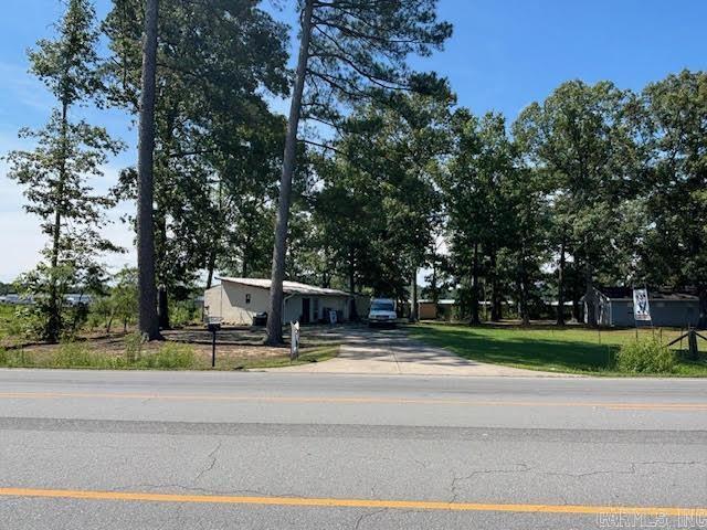 Fantastic land opportunity at a reasonable price for commercial/industrial development on the fast growing White Oak Crossing corridor between Maumelle and I-40.  This high visibility, high traffic site is located among many newer commercial developments near the Country Club of AR, Counts Massie Road, and White Oak Crossing roundabout and is across the street from the Maumelle Charter High School.  Less than a block away a new ACE Hardware store is under construction, and there is much more development to come for this area.  There is currently a mobile home on the site that will need to be removed at the time of sale.