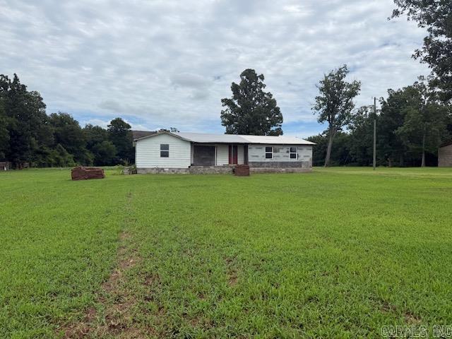 Charming 3-acre parcel with a fixer-upper home — ideal for investors, hobby farmers, or buyers seeking acreage and potential. Property includes an existing residence in need of repairs; being sold AS-IS. Spacious, level lot offers room to renovate, expand, or build a new homesite. Adjacent 3-acre lot (MLS #26021342) may be purchased with this property for additional acreage. Convenient location with easy access to local amenities. Buyer to verify utilities and all property details.