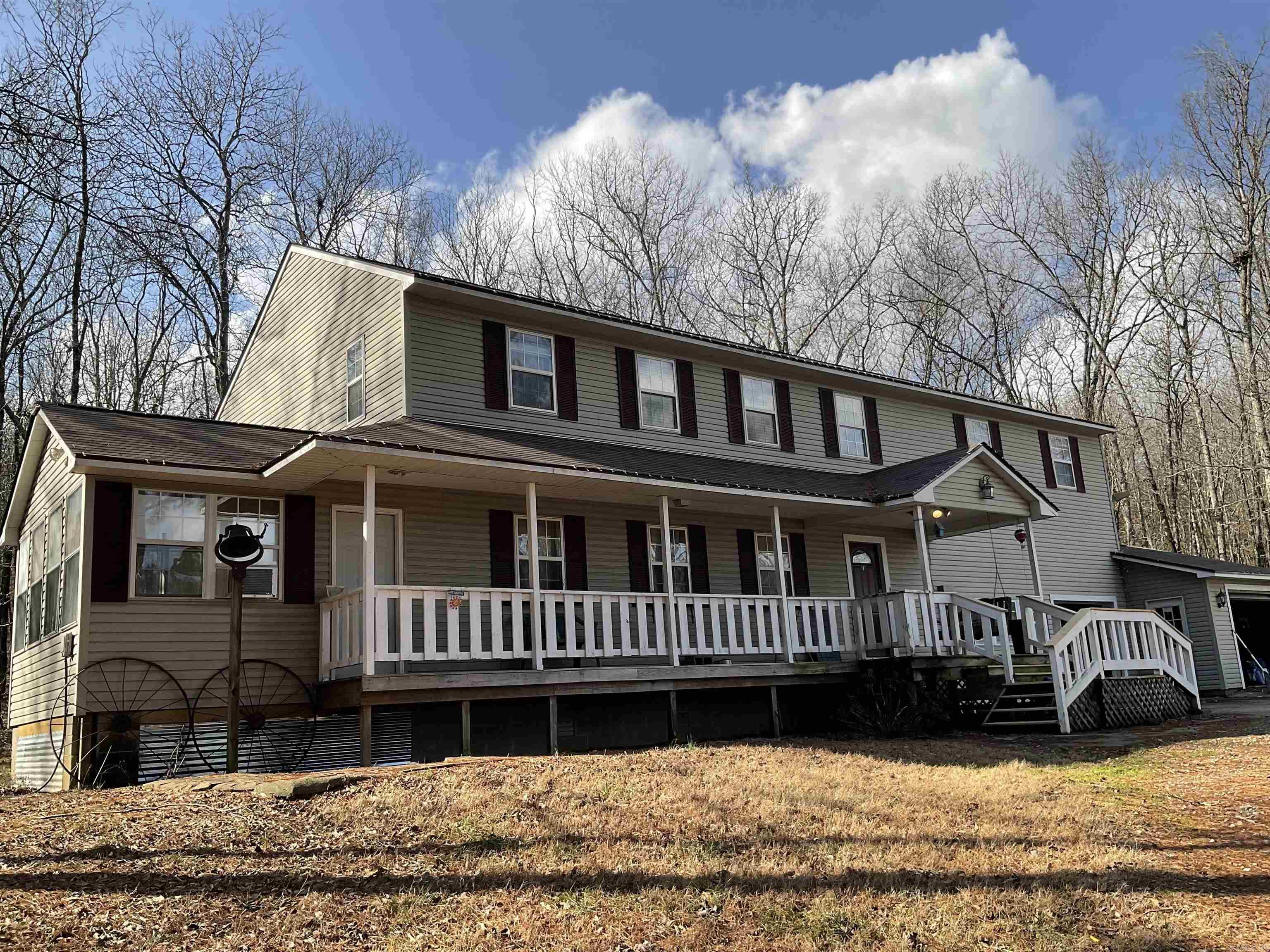 Peace & Quiet 5/3 2923 sq home sitting on 14.81 private acres.  Perfect for a small farm or growing family. Fully fenced, 8x12 Chicken Coop and multiple outbuildings for all your needs.  Large game room with bar, sink, pool table and projector system. Ready to entertain guests.  New roof in 2023 along with many other updates.  Agents see remarks.