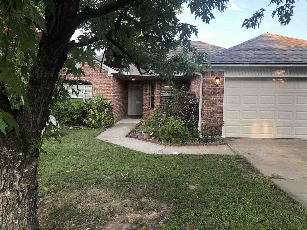 MUST SEE!! This adorable home has a split bedroom floor plan with lots of storage. Tray ceilings in living room and master. The fully fenced backyard has a covered patio perfect for entertaining. New roof 2018, dryer 2019, fridge 2020 and new A/C 2020. Bryant Schools!! Refrigerator, washer, dryer and play equipment stay. Agents, see remarks.