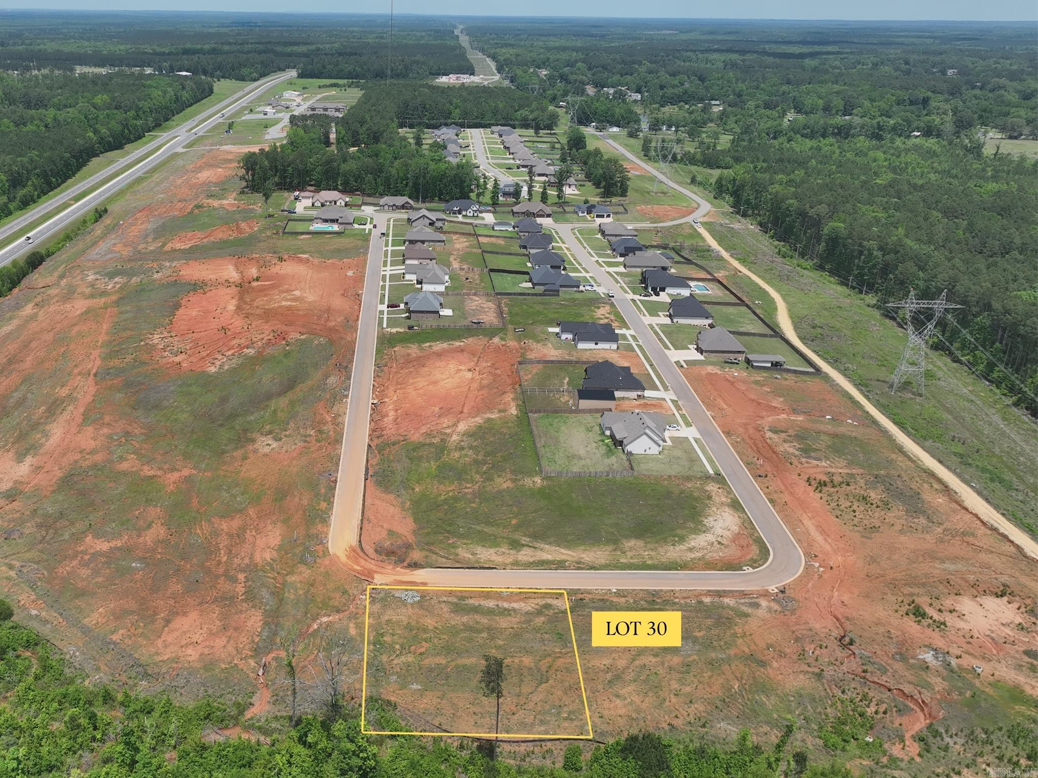 Build your future home in the peaceful Oak Tree South subdivision in Sheridan, Arkansas. Lot 30 offers a convenient location just minutes from Hwy 167, providing quick access to Sheridan, Little Rock, and surrounding areas while still enjoying a quiet residential setting. This homesite combines small-town comfort with easy access to shopping, dining, schools, and everyday amenities. Don’t miss this opportunity to own a residential lot in one of Sheridan’s growing areas.