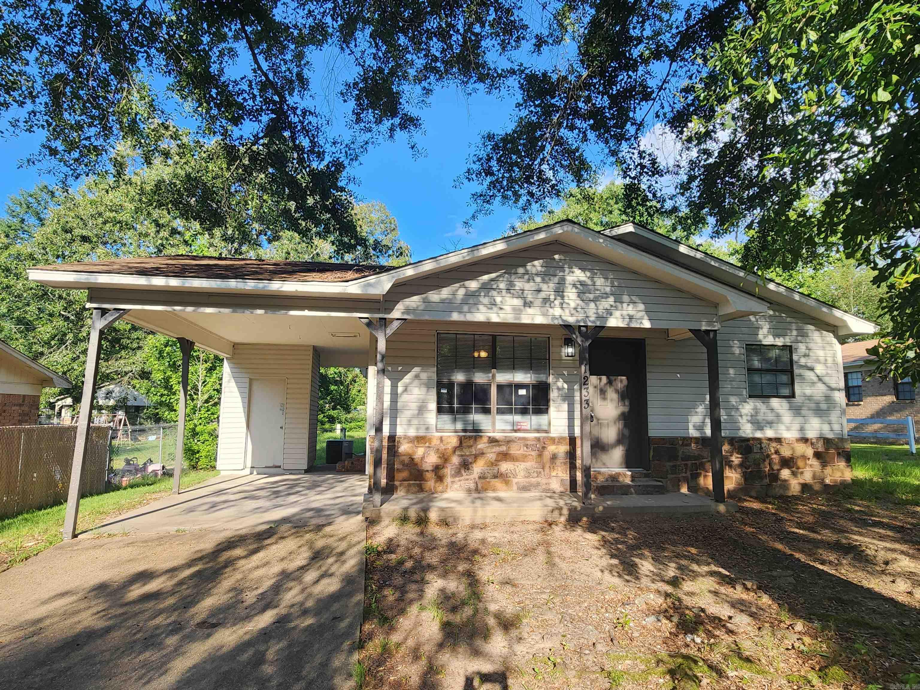 Gorgeous, Newly Renovated Home in GREAT Location! On a quiet, established street. 3 Bed 1 1/2 Bath w/ Carport. Fenced-In Yard on a Nice Level Lot. Open Concept Living, Dining, and Kitchen Flow. Very Spacious! ALL NEW Flooring, Paint, Fixtures & More! GRANITE Counters in Kitchen and Baths. NEW Range and Dishwasher to be installed. Super Low Taxes! Just move in and enjoy!
