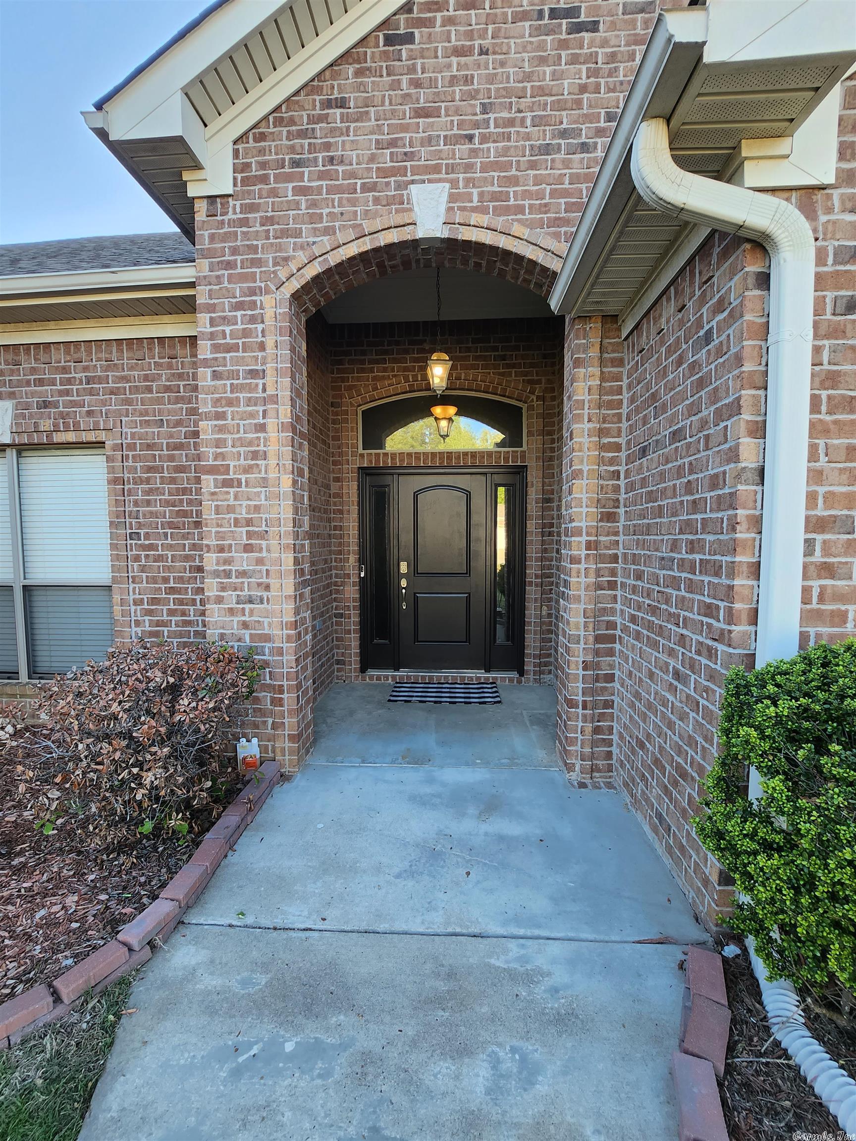 Beautiful 4 bedroom home in a very desirable Bryant Subdivision, only 5 minutes or less from restaurants, Grocery stores etc. and less than 2 minutes from I-30 for a quick commute to the office!  Your family will enjoy the unique 12 ft vaulted/barrel living room ceiling, stainless steel appliances with eat-in kitchen and separate dining area! The split floor plan offers privacy from the children and quick access to the garage and laundry room! Fully fenced back yard with storage building that will stay and a built-in dog pin/ dog walk for your four-legged family members! The large back porch is covered making an excellent entertainment space!  Agent, see remarks