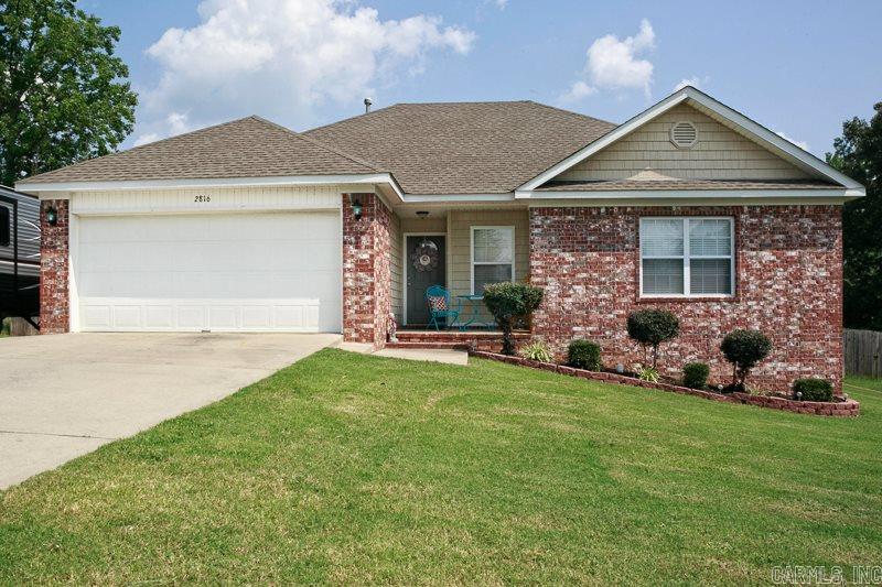 Immaculate, Like new home w/an oversized yard .34 acres, you'll love this layout 3 bedroom 2 bath home.  Large open great room w/brand new hard woods floor and tray ceilings. Kictchen offers new counter, tile backsplash, hardwood cabinets, oversized sink and breakfast bar. The master is split with tray ceiling, his/her vanities, sep jetted tub and shower. Huge spare bedrooms, outdoor area features an oversized custom built covered patio w/deck, w/brand new 2017 10X12 outdoor shed, yard is fully fenced!