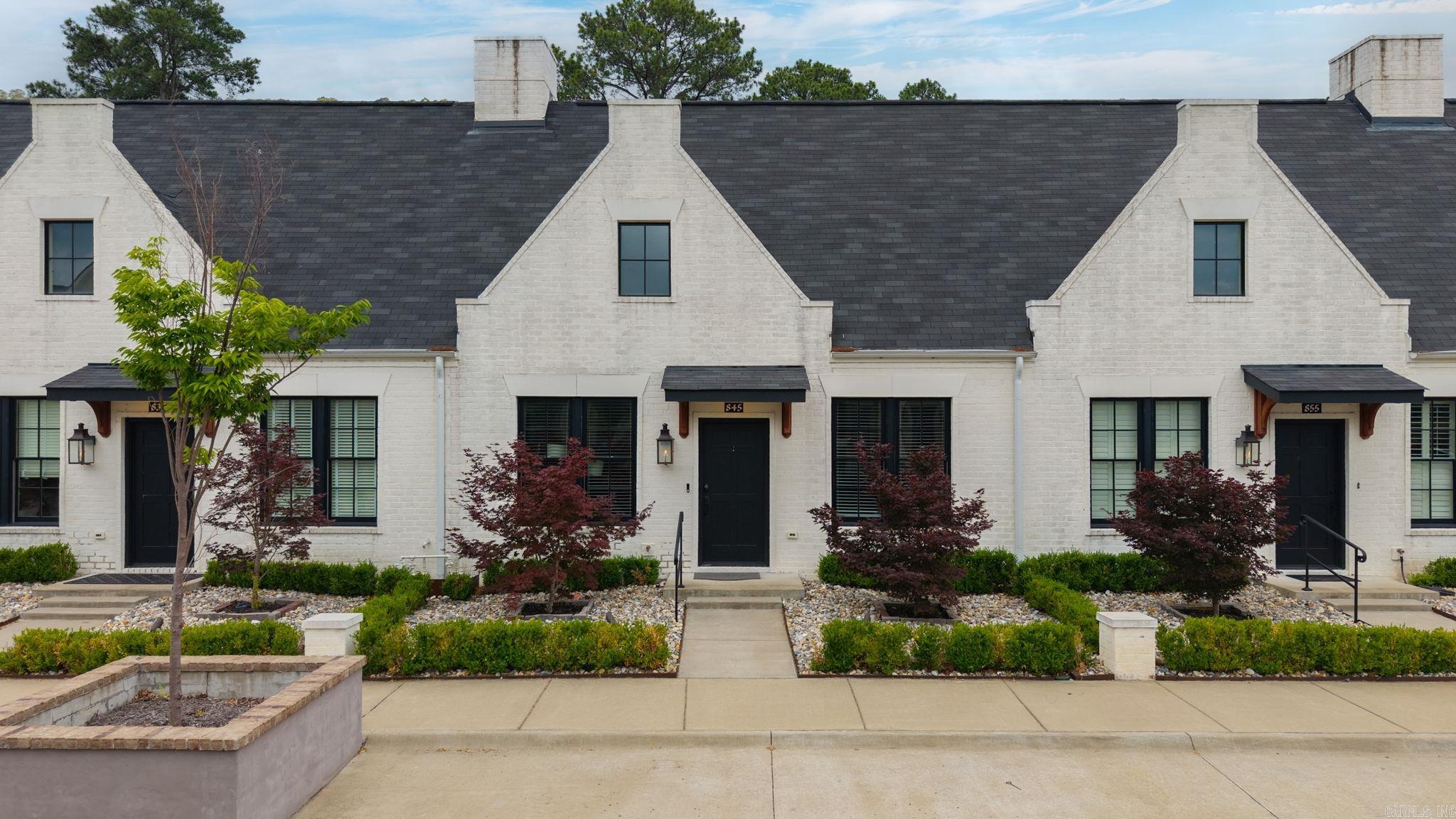 Check out this Luxury townhome located in the highly sought-after community of Hendrix Village. This 2 bedroom, 2 bathroom unit features custom cabinetry, a gas stove, soaring oversized ceilings, and stylish finishes throughout and fenced area in the back of home. Enjoy the convenience of being within walking distance to local coffee shops, restaurants, and all that Hendrix Village has to offer. A perfect blend of comfort, luxury, and location!