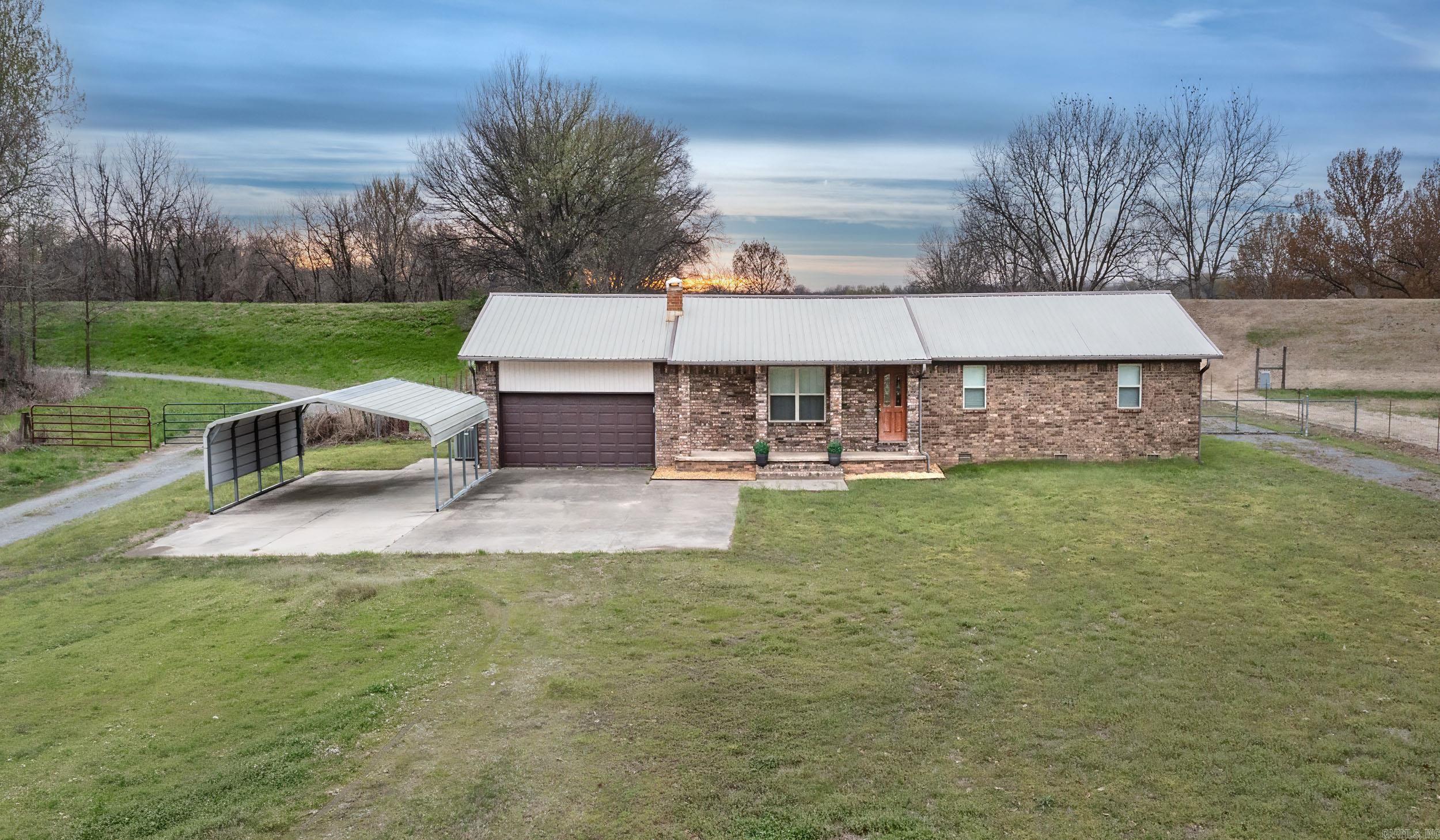 Lakefront Living with Private Access and Endless Outdoor Enjoyment. Experience the perfect blend of comfort and nature in this inviting home set on expansive, level acreage with direct access to the lake. This property offers a rare opportunity to enjoy your own private dock and boat launch, making it ideal for fishing, boating, and relaxing waterfront days. Featuring 3 bedrooms and 2 baths, the home provides a functional layout with comfortable living spaces filled with natural light. Step out onto the spacious back deck—perfect for entertaining or unwinding in the evenings—then take a short stroll to the water where you can cast a line or simply enjoy the peaceful surroundings. Surrounded by scenic beauty and known for great fishing, this setting creates a true outdoor retreat with space and privacy. Whether you're looking for a weekend escape or full-time lake living, this property delivers a lifestyle you’ll love—schedule your private showing today. *Some photos have been virtually staged*