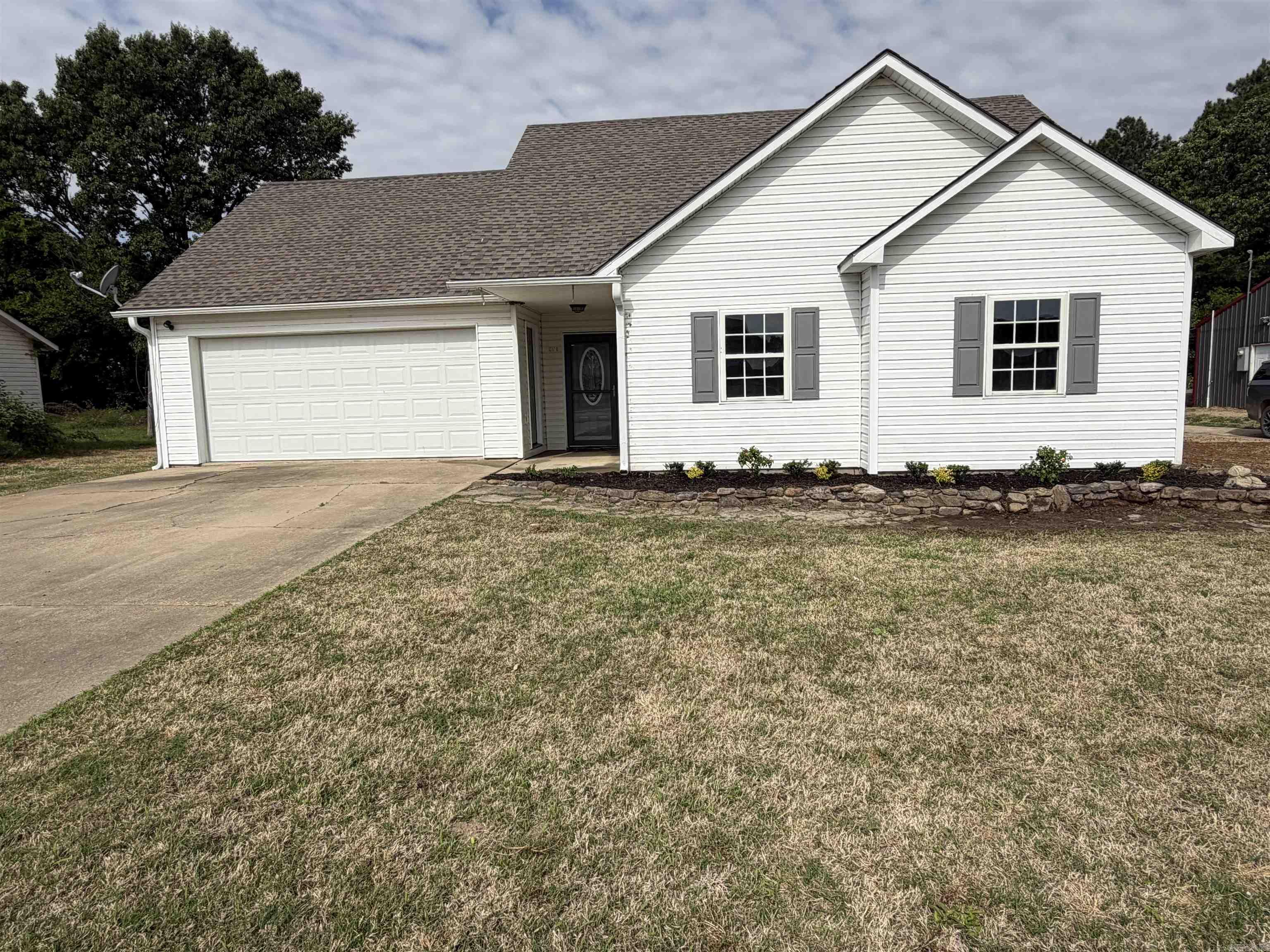 Updated 3 bedroom/2 bath home located in Bono, AR. This home includes an additional lot that has an 1200 sqft shop with heat/air, water, sewer,  electric and a 10x40 lean to on the back. The backyard you will find a clubhouse that also has electricity. **Agent owned.