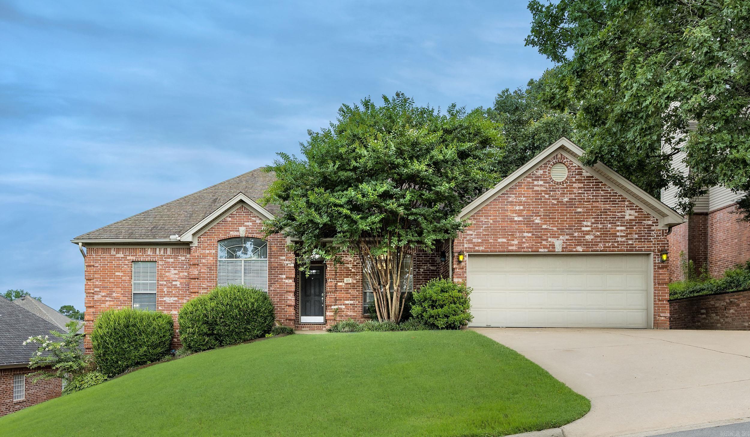 Welcome to this beautifully maintained one-level home in the desirable Chenal Valley community of Little Rock. This 4-bedroom, 2-bath residence offers 2,306 square feet of comfortable living space with a spacious and inviting floor plan. Beautiful wood floors and pleasant colors welcome you inside, leading to a formal dining room and a great room featuring a cozy gas log fireplace. The bright kitchen offers abundant natural light, a breakfast area, breakfast bar, and well-equipped appliances including a nearly new range and microwave. The oversized primary suite provides a private retreat with a spacious en suite bath and separation from the additional bedrooms. Enjoy the large backyard with a new wooden privacy fence, perfect for pets, children, and outdoor gatherings. Additional features include a two-car garage, laundry room, and access to Chenal Valley amenities including a pool, clubhouse, playground, picnic area, and golf course. Located in a friendly neighborhood, this home offers comfort, convenience, and an exceptional lifestyle. Don’t miss the opportunity to make it yours!