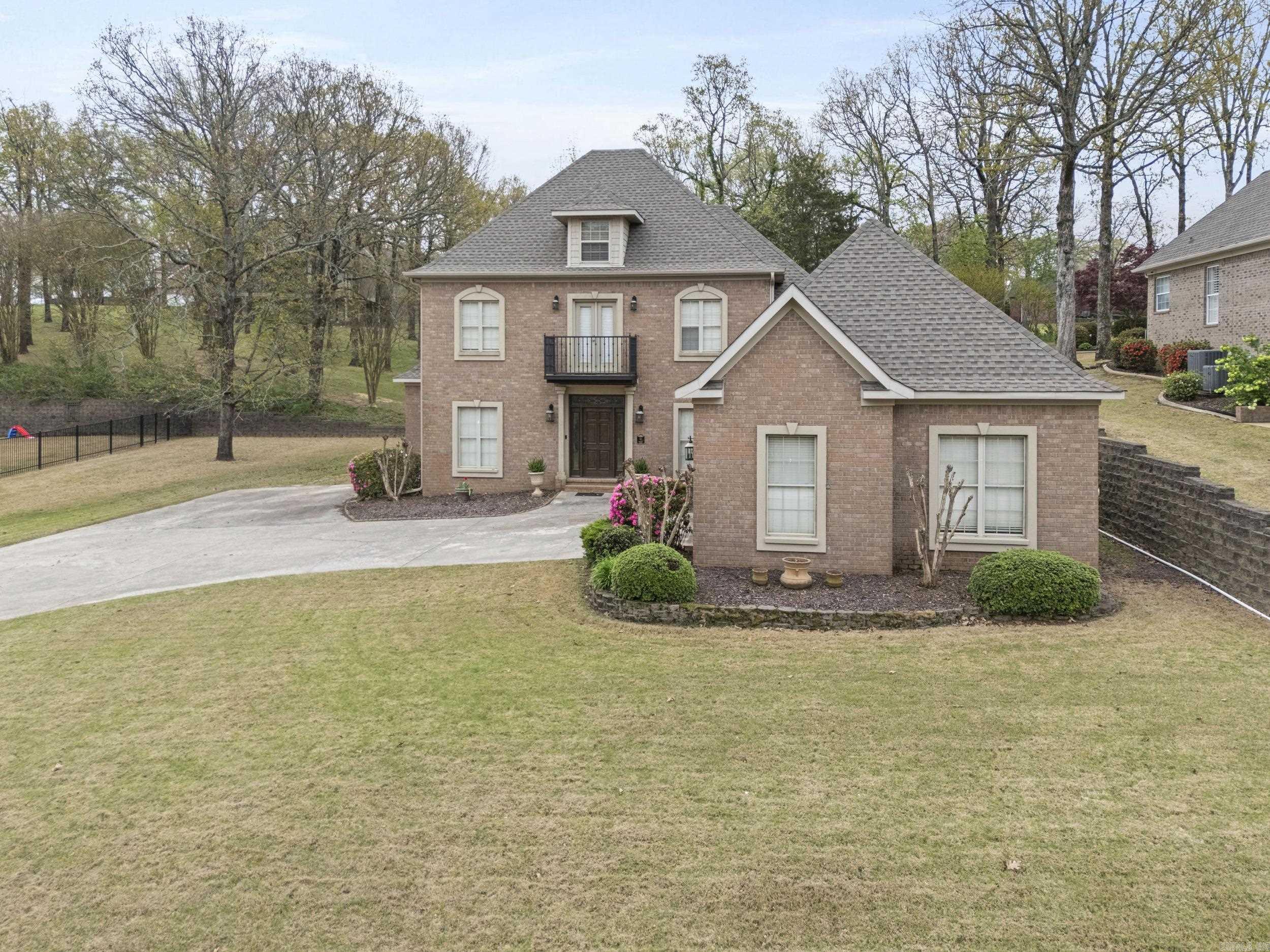 This immaculate and beautifully maintained home in the desirable River Oaks subdivision offers exceptional space and comfort, featuring four bedrooms plus a flexible fifth room that can serve as an office or additional bedroom. The updated kitchen boasts granite countertops, abundant counter space, extensive cabinetry, and a double oven, making it perfect for everyday cooking and entertaining. With three full baths, a convenient half bath, and a laundry room complete with a sink, the home is designed for both practicality and ease. A bright sitting room/sunroom overlooks the sparkling pool through large windows, creating a relaxing retreat filled with natural light. Two car garage has ample space to hold  a golf-cart.  Conveniently located and move-in ready, this home blends style, function, and an inviting atmosphere.