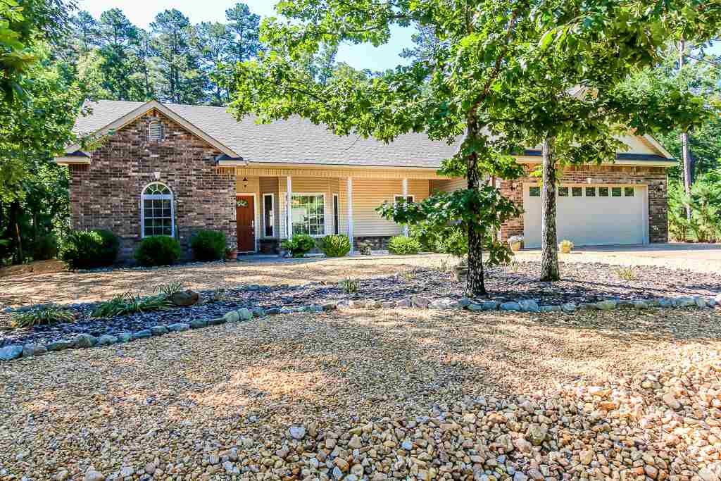LIKE NEW home in a great EAST SIDE Neighborhood.   Open, split BR plan offers privacy for you & guests. Vaulted ceilings in the spacious Great Room, Dining Room, Kitchen, and Master BR. Other features include gas fireplace, walk-in shower, jetted tub, double sink vanity, walk in shower, bay window, lots of crown molding, Hunter Douglas blinds, hardwood, solid surface counters, pantry w/pull out shelves & more. Level lot w/low main. landscaping, open and covered deck.  YOU MUST SEE THIS MOVE IN READY HOME!