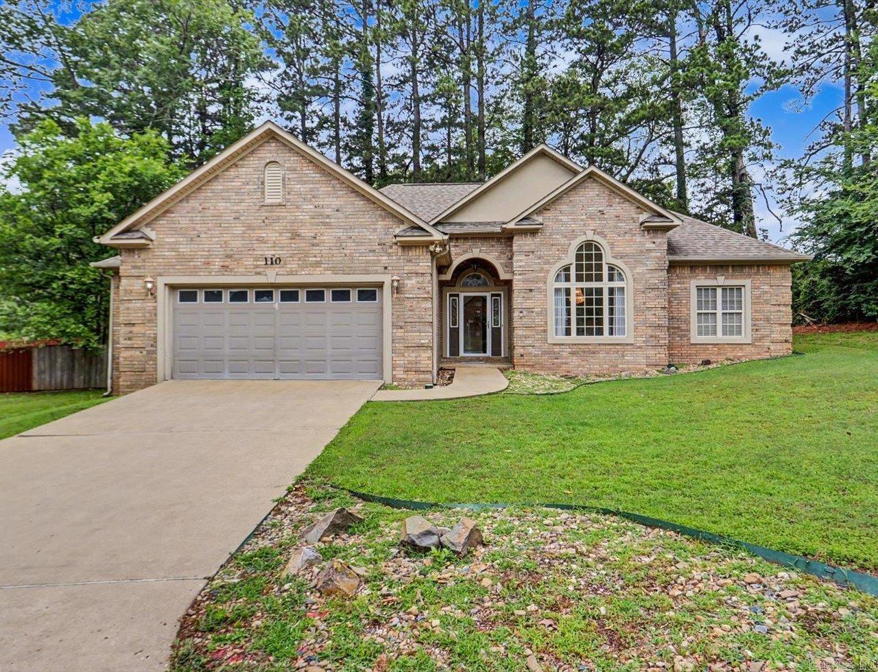 Beautifully updated 3-bedroom, 2-bath home ideally located off Carpenter Dam Road with convenient access to Highway 270 and just minutes from some of Hot Springs’ most sought-after destinations, including Lake Hamilton, Lake Catherine, and Garvan Woodland Gardens. Enjoy close proximity to boating, fishing, hiking, dining, shopping, and outdoor recreation while still being tucked into a convenient residential setting.  Inside, the home features an updated kitchen with stainless steel appliances, gorgeous granite countertops, and an oversized breakfast bar that opens to the main living space—perfect for entertaining or everyday living. The spacious living area offers a cozy gas fireplace and an inviting layout with abundant natural light.  The primary suite serves as a private retreat with a walk-in closet, walk-in shower, and relaxing jetted tub. Two additional bedrooms and a second full bath provide flexibility for guests, family, or a home office.  Two-car garage, dedicated storage room, and numerous updates throughout that make this property move-in ready.