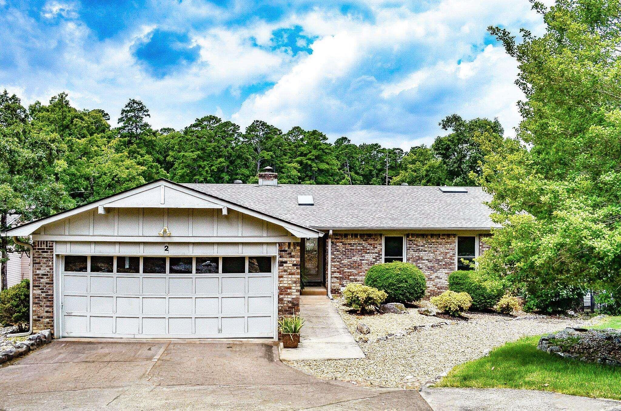 Welcome to this beautiful 4 bedroom 3 bath lakefront home just steps away from Lake Cortez. Desiged with comfort and space in mind, the living room features a cozy atmosphere with fireplace and vaulted ceilings in the family room that create an open, airy feel. Enjoy breathtaking views from multiple living areas, upper and Lower decks, along with a spacious bonus room downstairs that's perfect for a game room or additional family gathering space. The brick exterior and attached 2 car garage add timeless curb appeal and lasting durability. Outside, you'll find everything you need to enjoy lake living, including your own private boat dock, a welcoming fire pit area for evenings under the stars. With generous living spaces, beautiful waterfront views and direct access to the lake, this home is a full time residence, vacation getaway or family retreat.