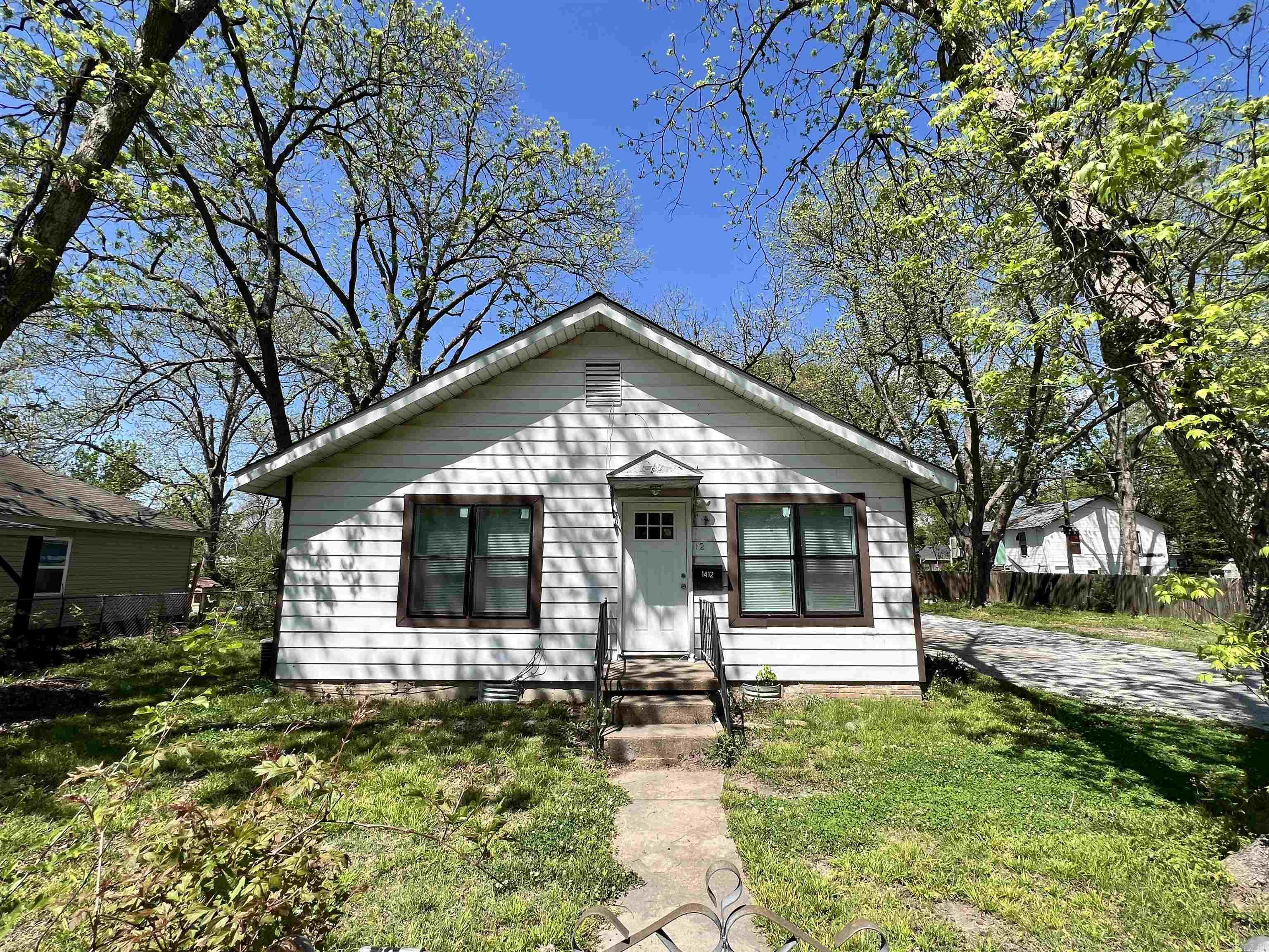 Investment opportunity! This three bedroom, one bath is currently rented for $1,400 monthly.