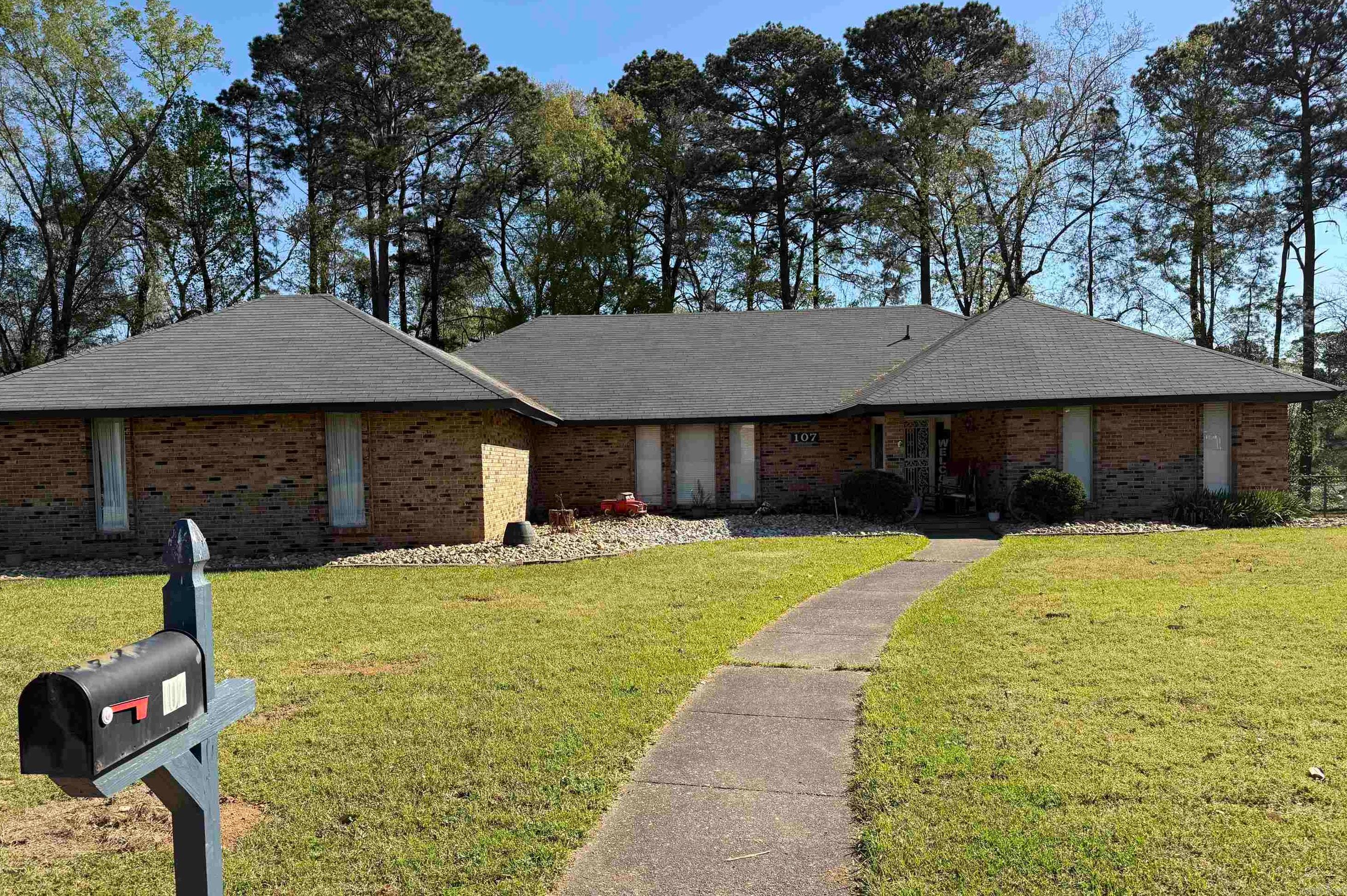 The beautiful home is back on the market.  It sits on a large, fenced lot with beautiful landscaping, that is currently in full bloom.  It has an oversized deck, RV cover and storage building in the backyard, and all located in a great neighbor.  The three-bedroom brick home has two and 1/2 baths, and two large living spaces.  One of those spaces could work as a fourth bedroom if needed.  The large hallways also make it easy to move about. The galley kitchen has granite counter tops and a gas range. This very spacious home has lots of updates and is move in ready. Schedule a showing today!