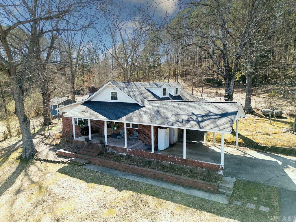 Located inside city limits yet offering approximately 7.74 acres m/l, this stunning 5-bedroom, 4-bath home perfectly blends space, comfort, and convenience. Inside, you’ll love the bright open floor plan designed for both everyday living and entertaining. The kitchen is truly the heart of the home—featuring beautiful finishes, generous counter space, and a seamless flow into the dining area that makes gatherings effortless. A dedicated office provides the perfect work-from-home setup, while the spacious bedrooms offer room for everyone. The mudroom adds everyday functionality, and outside you’ll find a fenced backyard with plenty of room to spread out—including space for chickens, a garden, or simply enjoying the peaceful acreage. This property gives you the best of country-style living with the convenience of being right in town.
